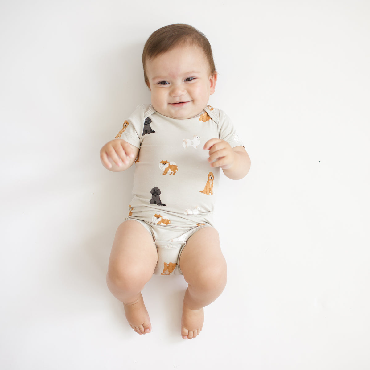 Baby wearing Bodysuit in Fluffy Dog
