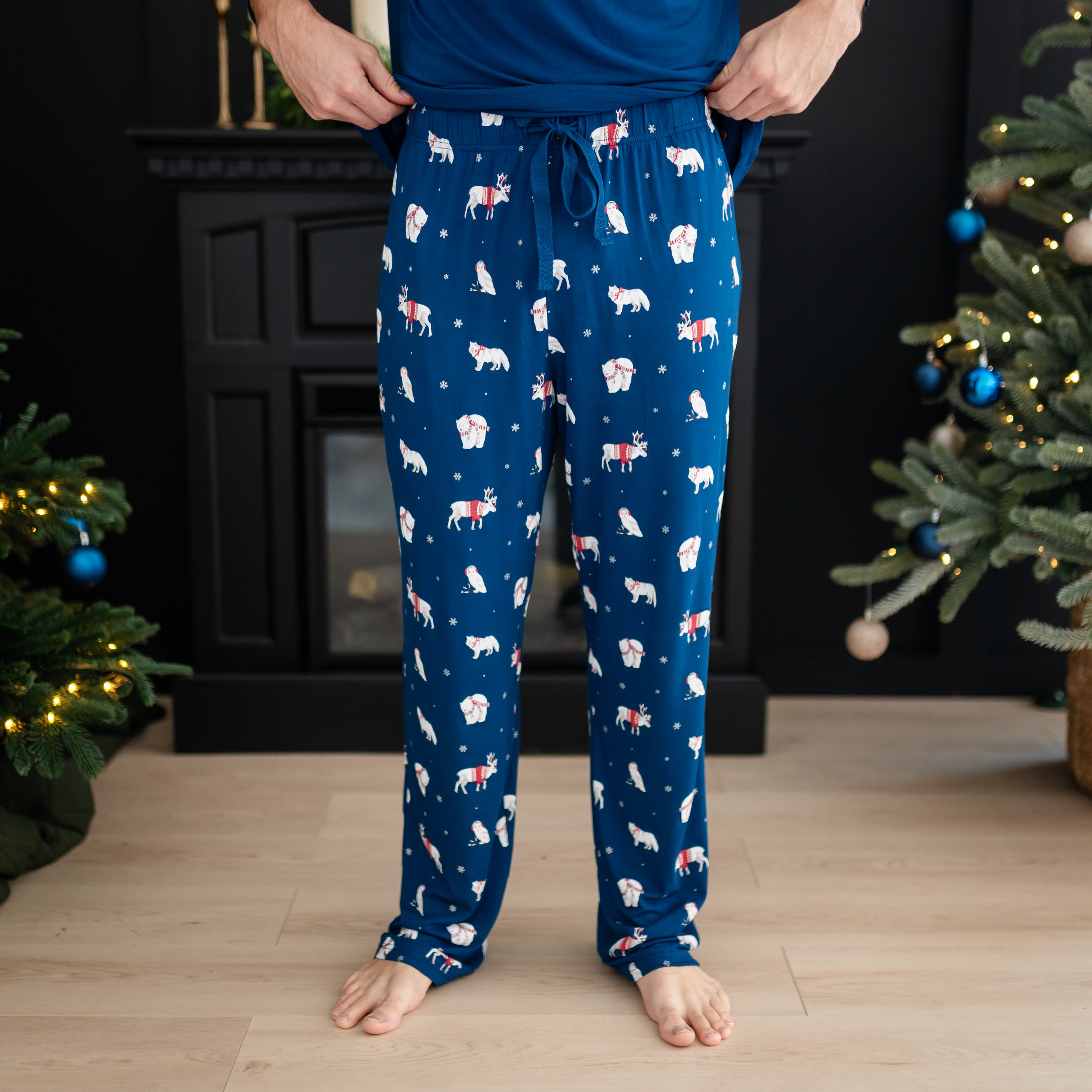 Men's Lounge Pants in Frosty Friends shown on a male model