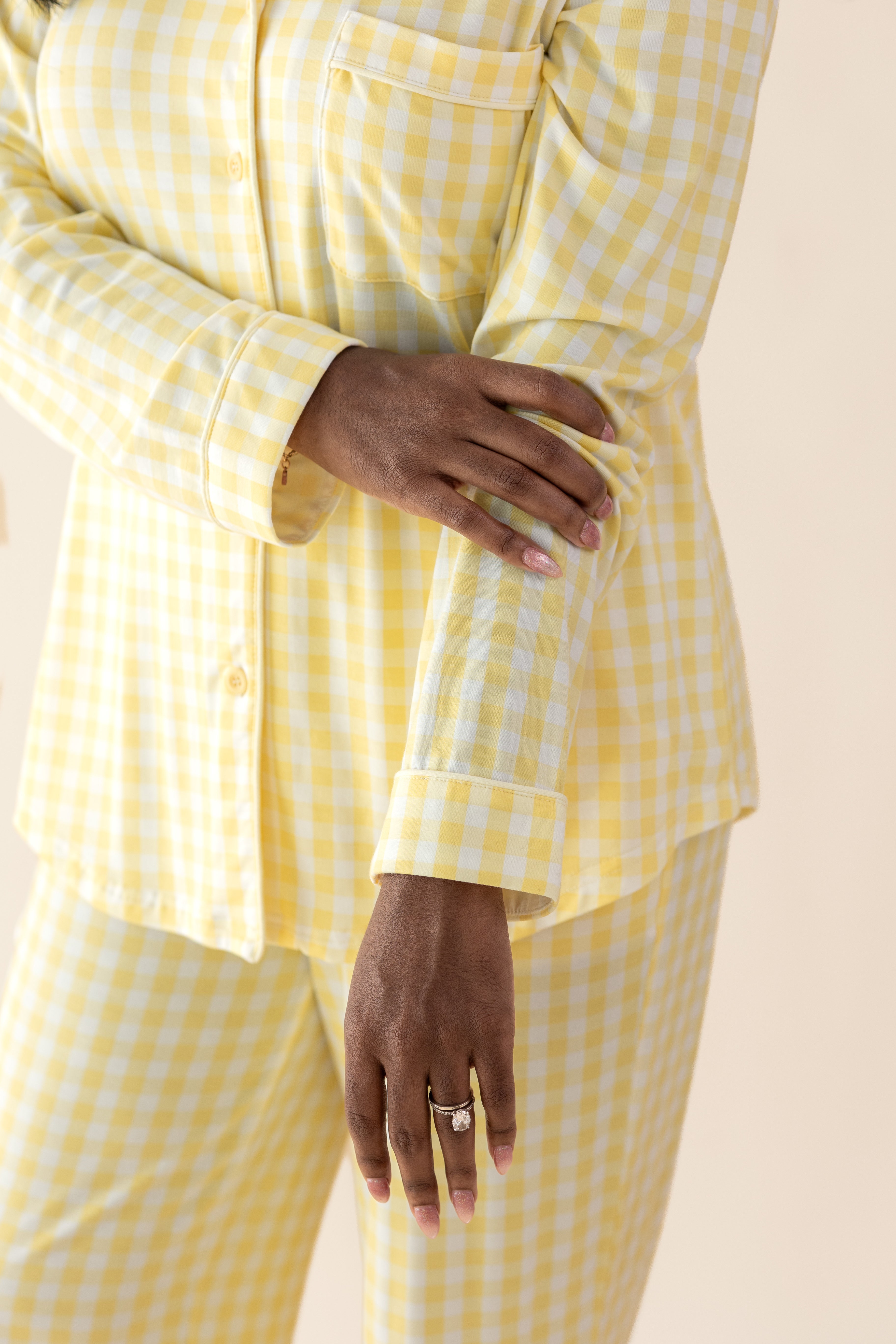Close up of the wrist cuff and yellow checkered pattern on the Long-Sleeved Women's Pajama Set in Gingham Chamomile