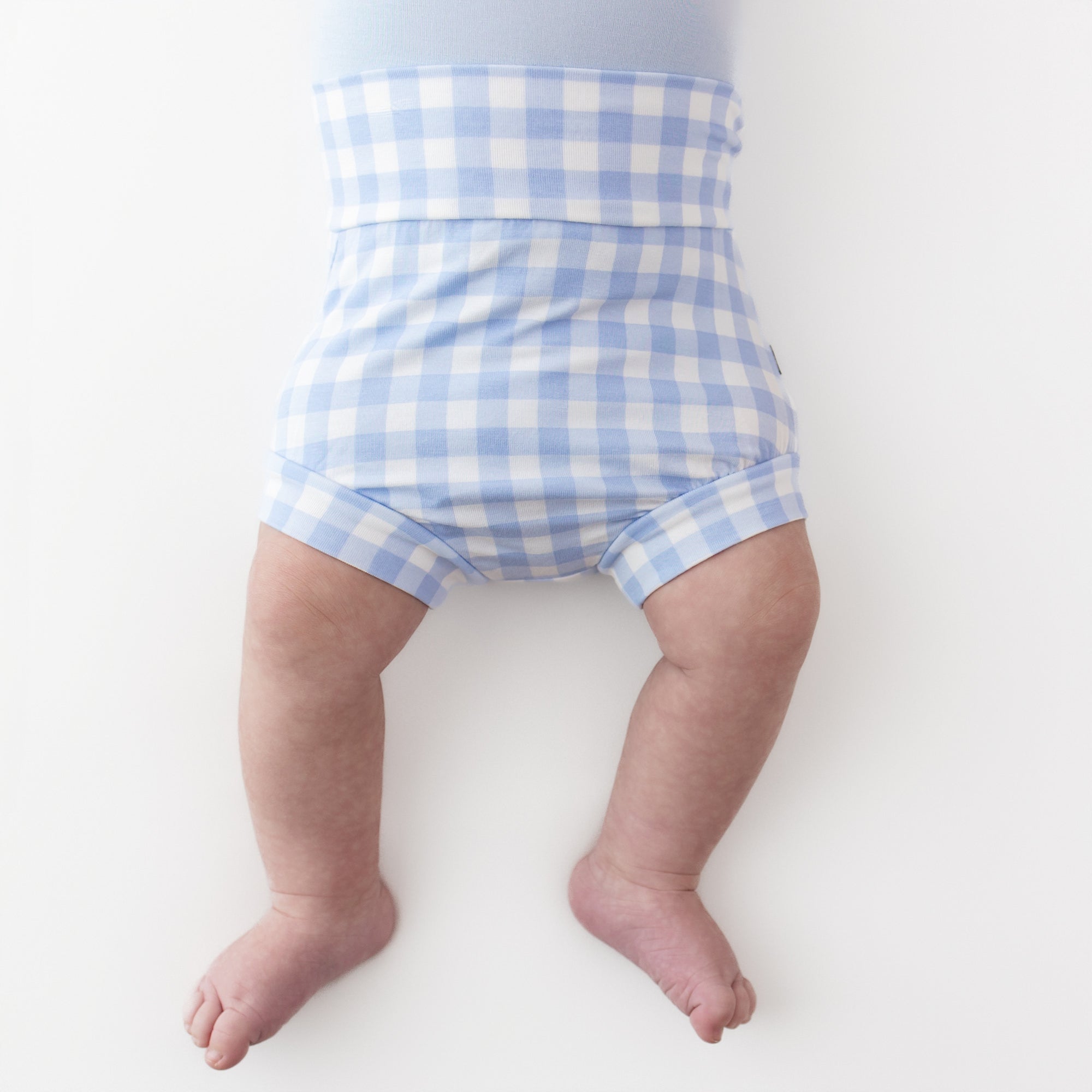 Bummies in Gingham Breeze shown on a young infant