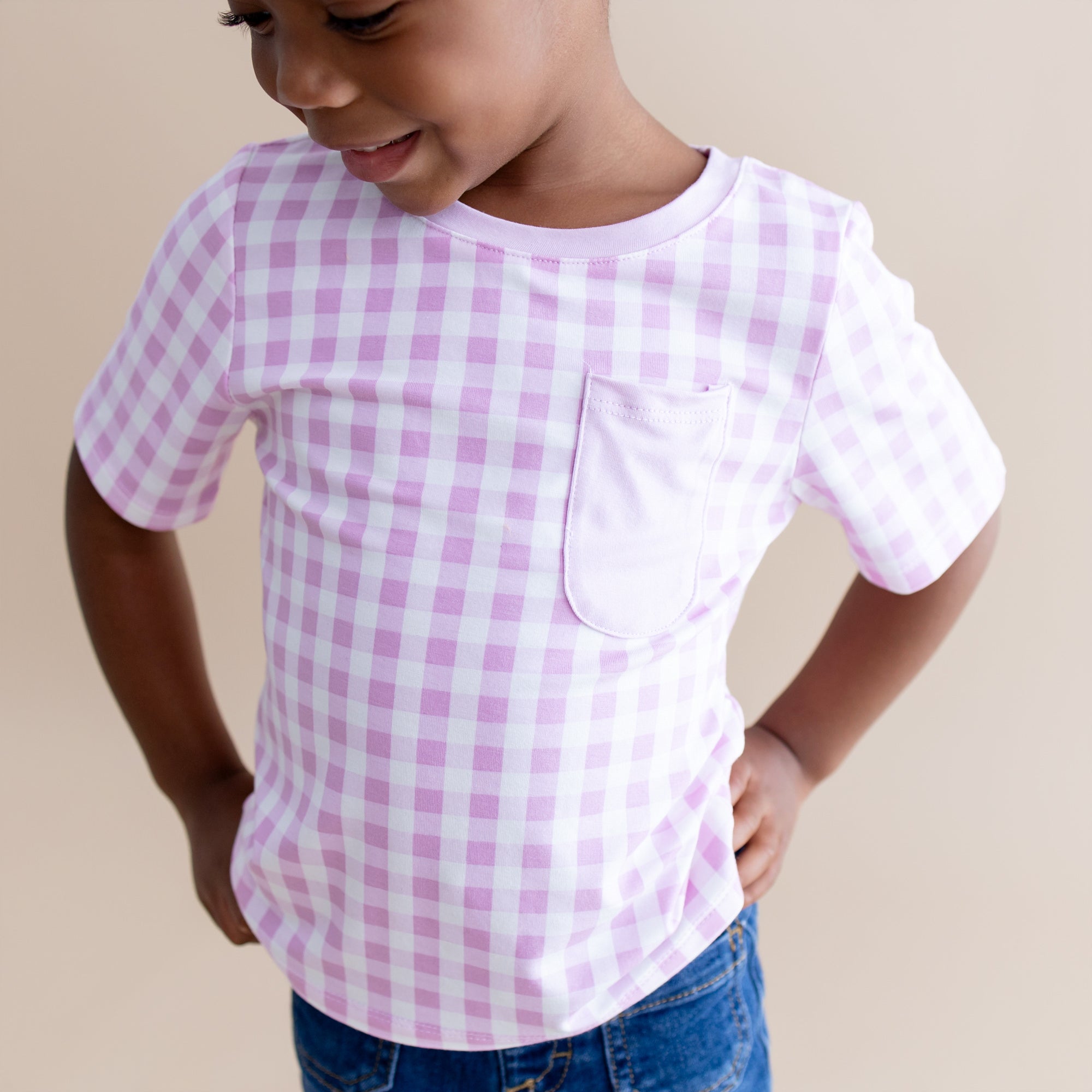 Close up of the Toddler Crew Neck Tee in Gingham Thistle shown on a young girl