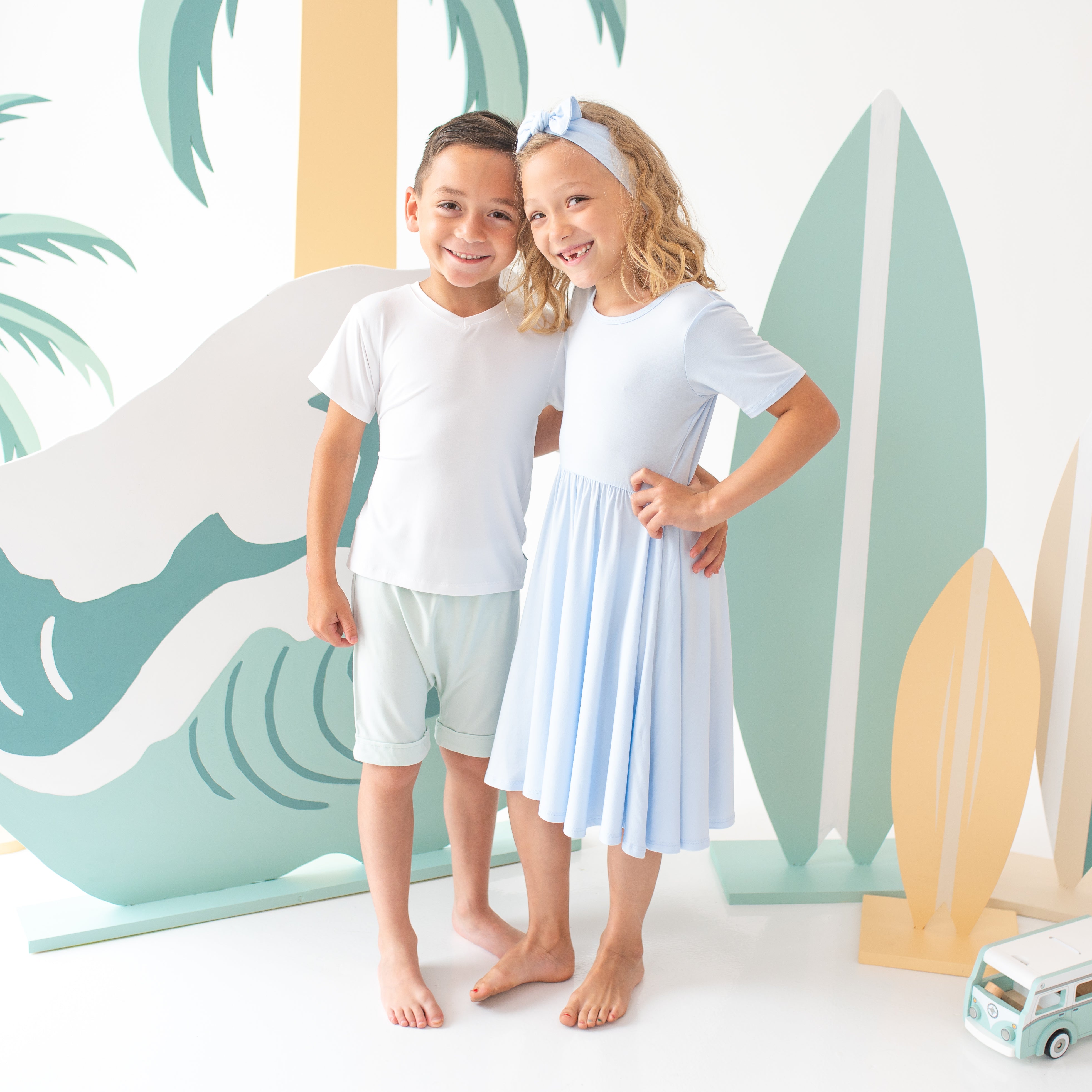 Children wearing Summer Bamboo outfits in Mist and Dew colors