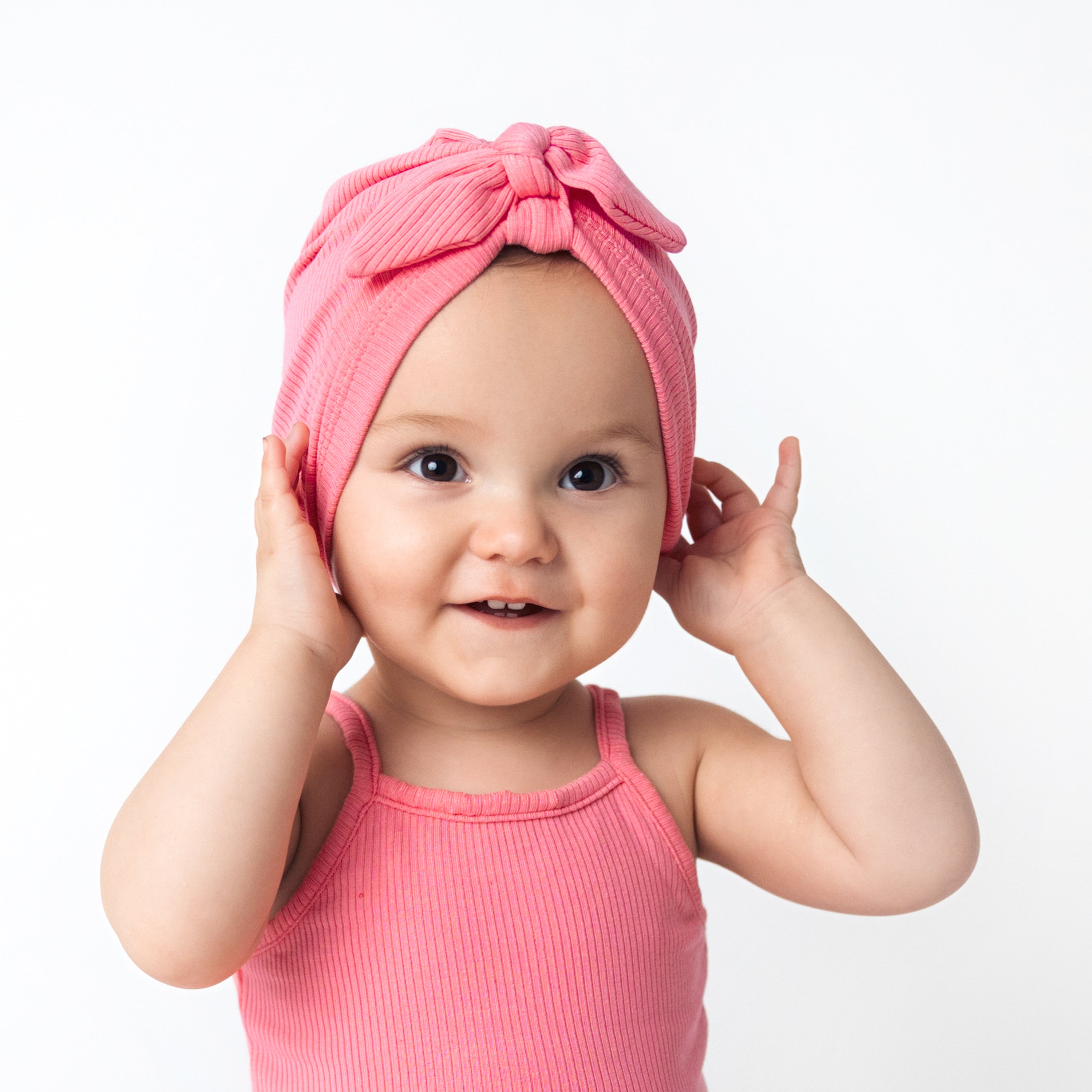 Child wearing Ribbed Headwrap in Guava Pink