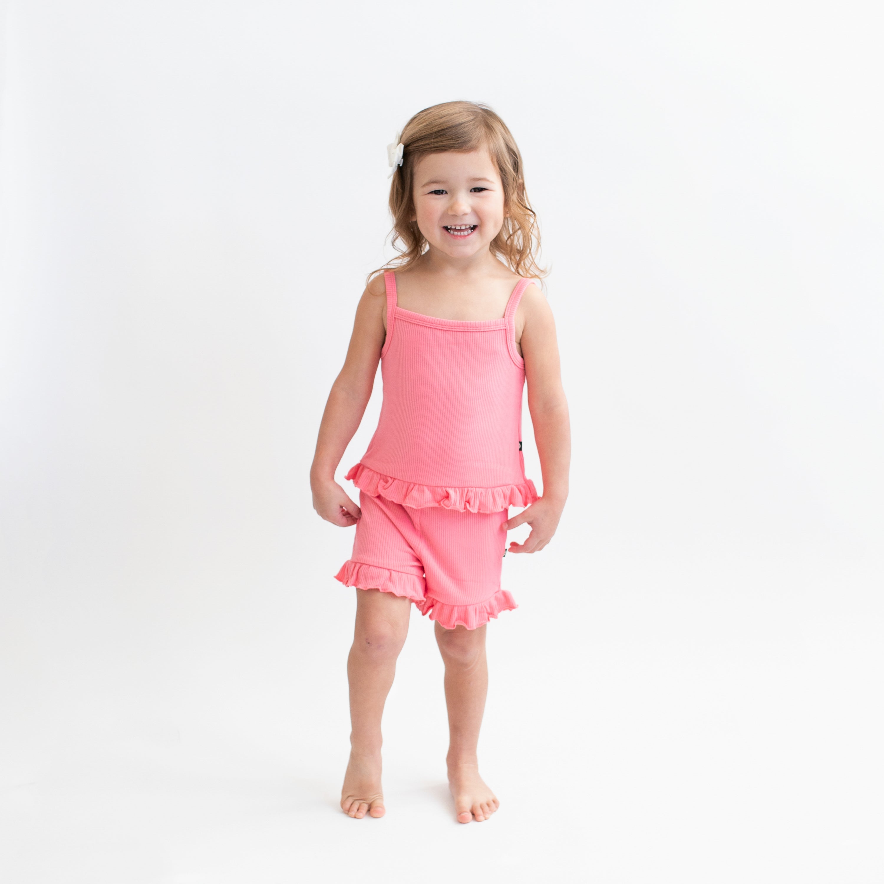 Toddler wearing Ribbed Ruffle Tank Set in Guava