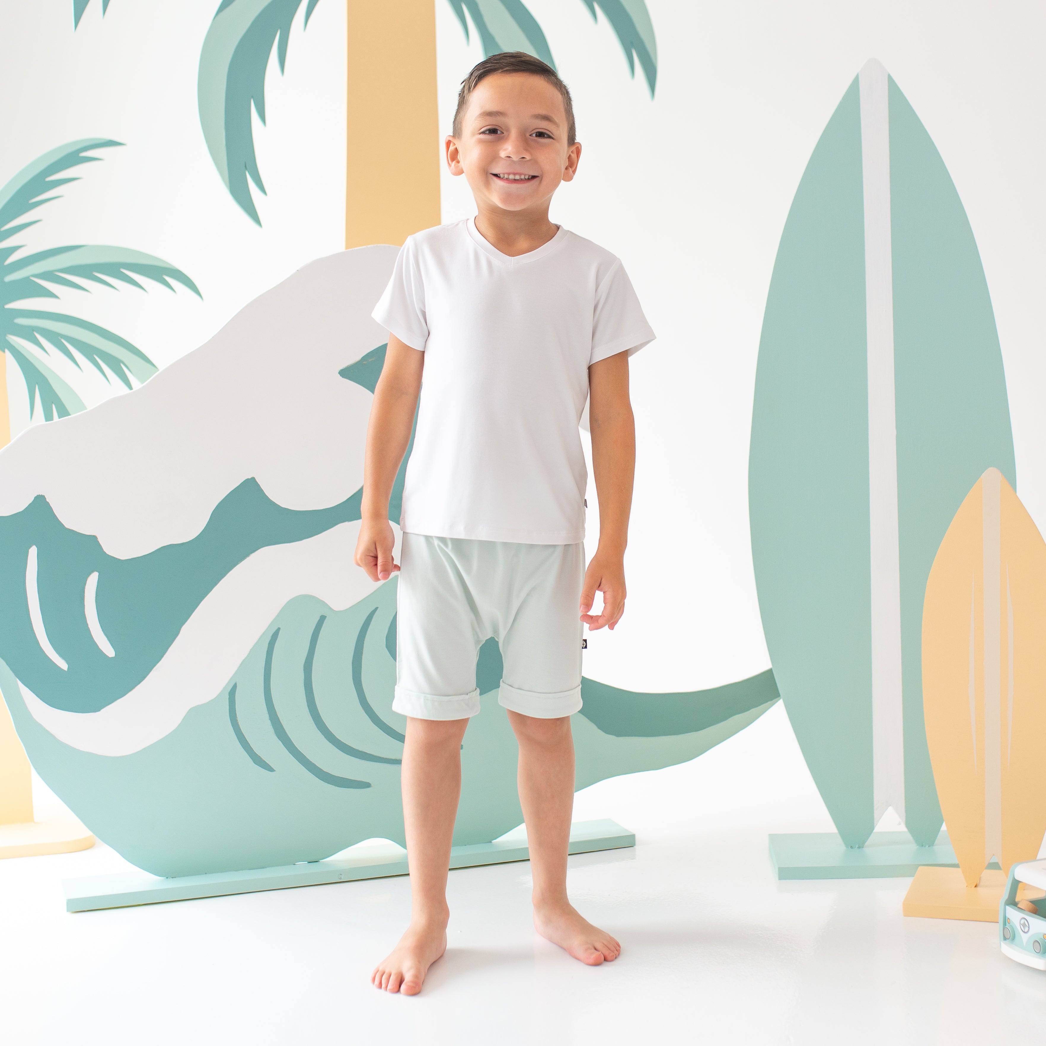 Boy wearing Harem Shorts in Dew with a Toddler V-Neck in Snow White