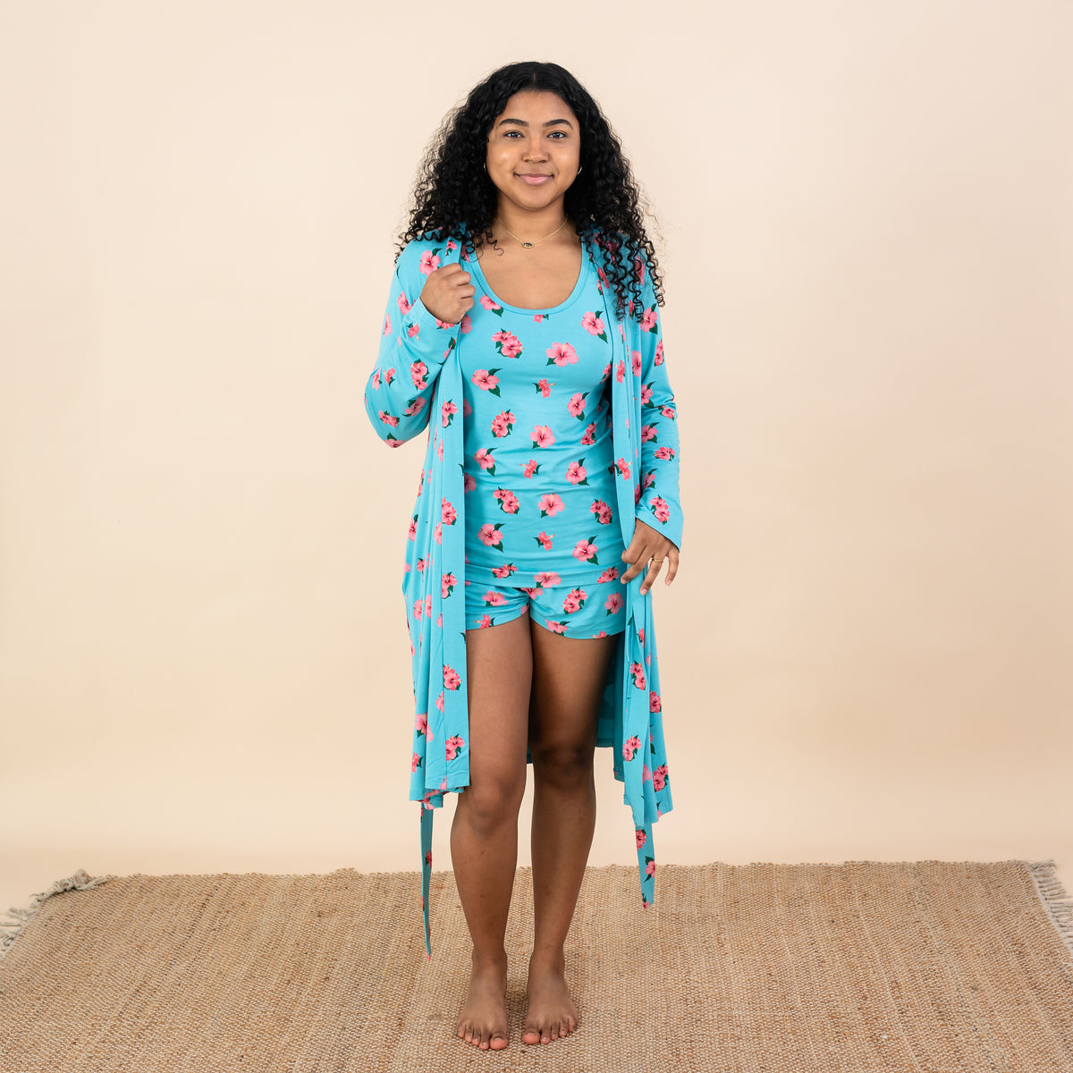 Woman wearing Kyte Tank Set and Lounge Robe in Hibiscus