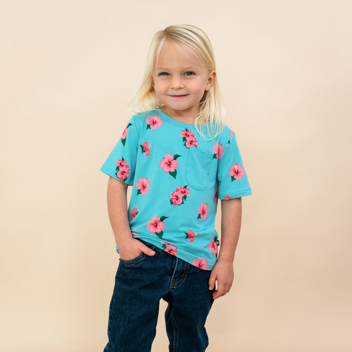 Toddler modeling Kyte Toddler Crew Neck Tee in Hibiscus