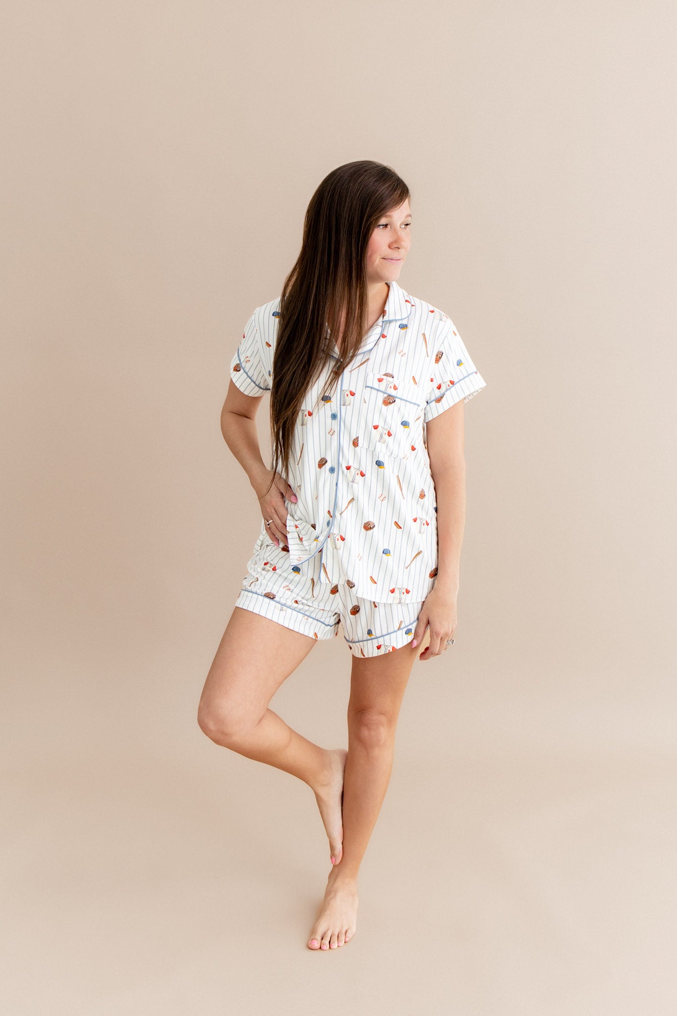 Female posing wearing the Women's Short Sleeve Pajama Set in Home Run