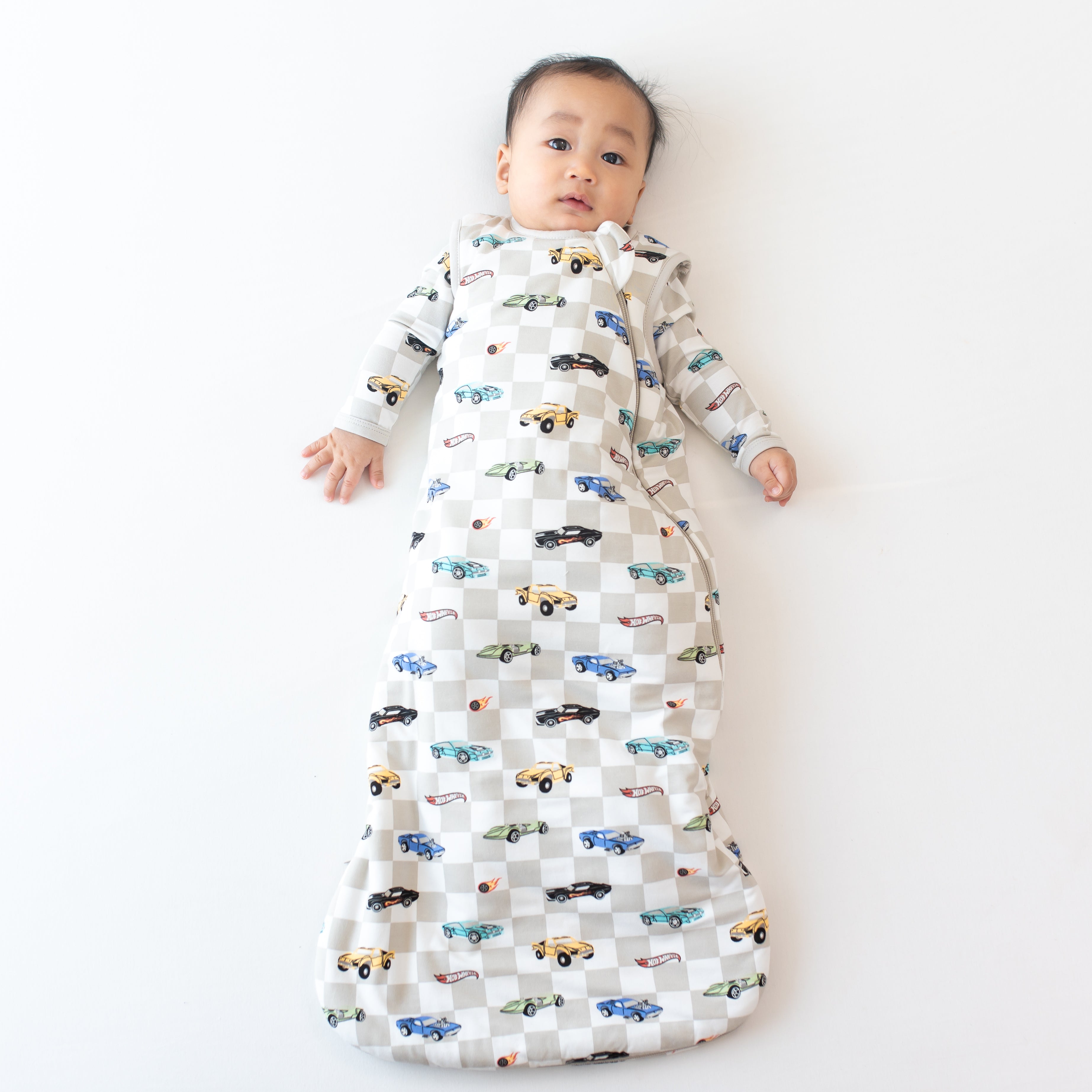 Infant wearing Hot Wheels Sleep Bag in Fast and Fierce 1.0 with matching Romper