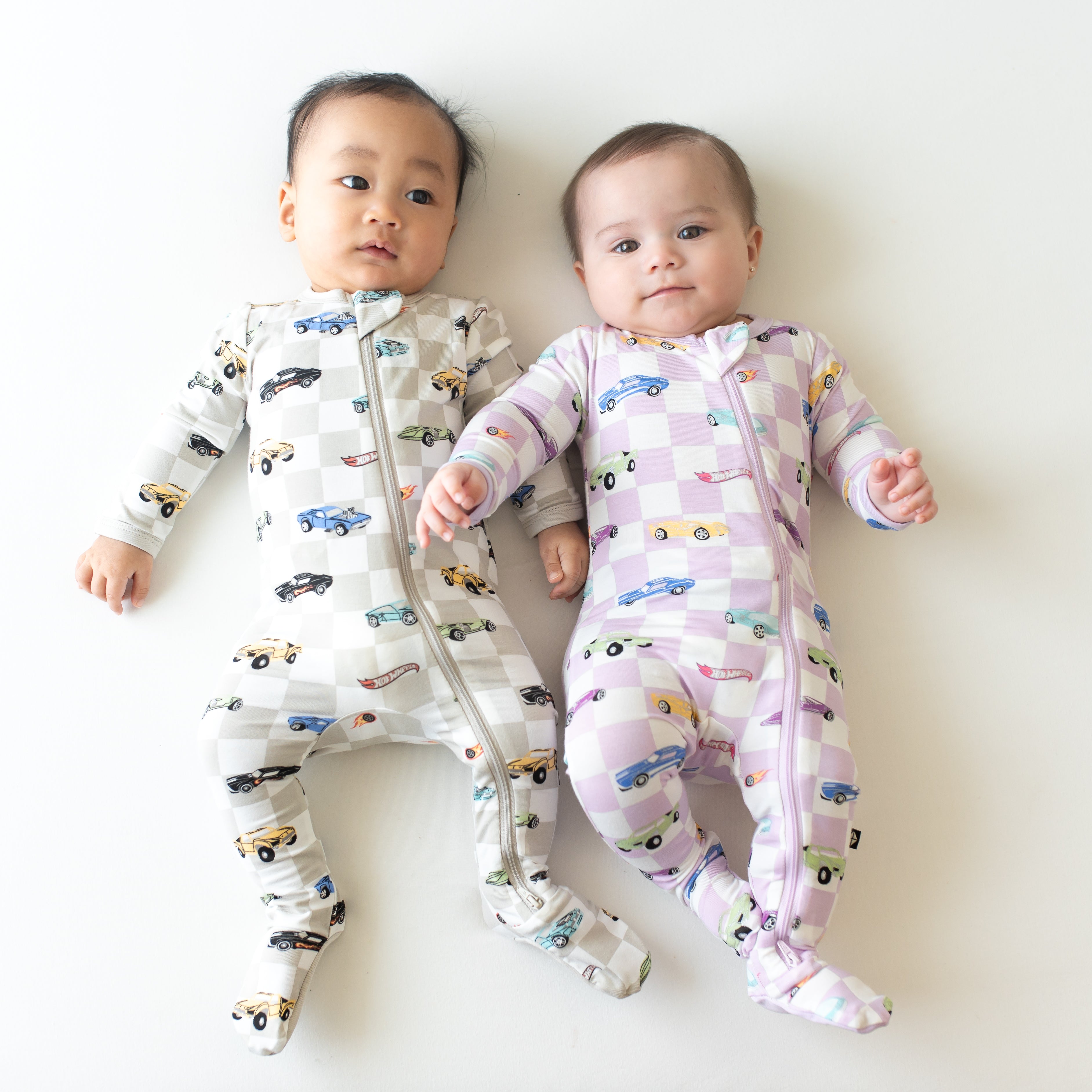 Infants wearing Zippered footies from the Hot Wheels™ collection
