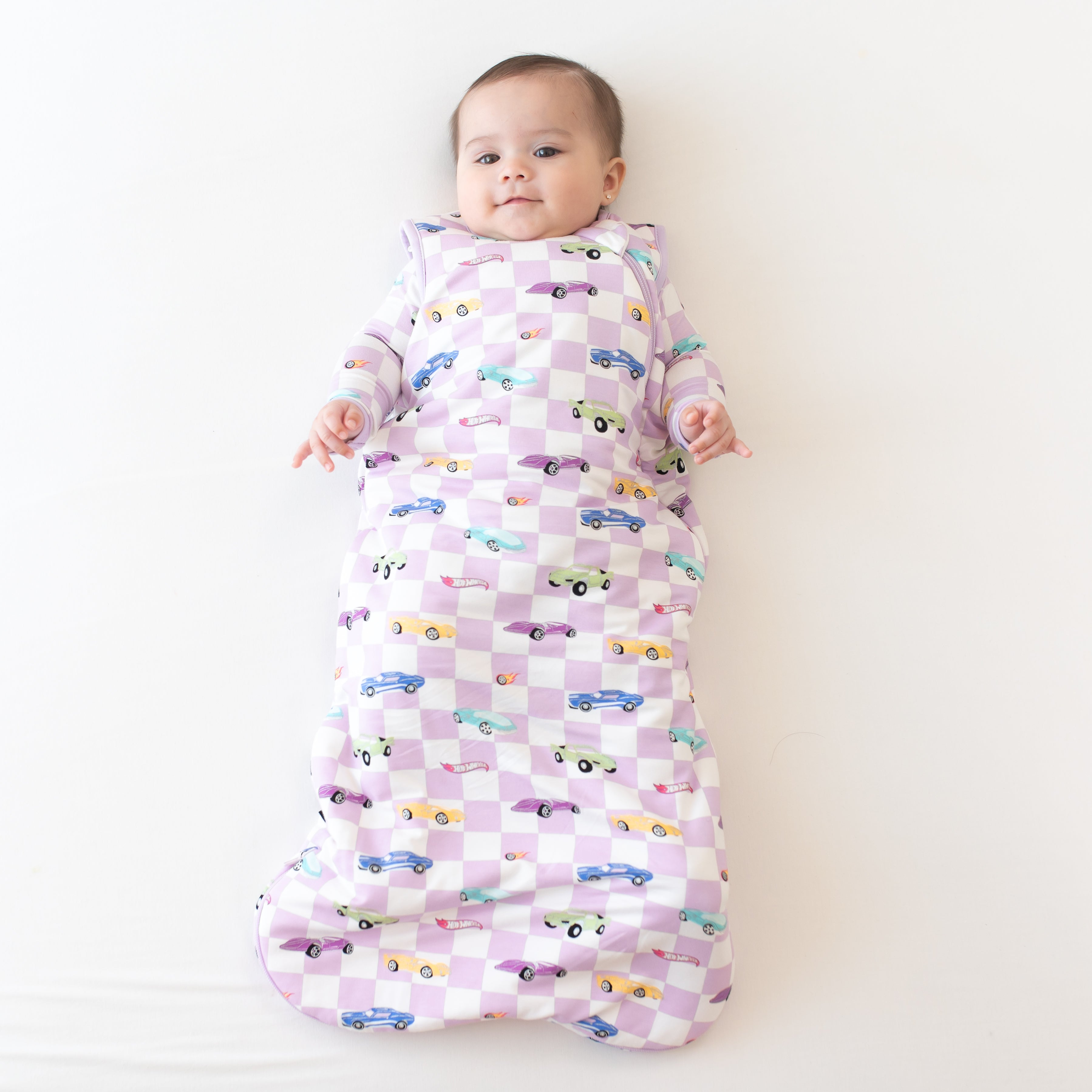 Baby wearing Hot Wheels Sleep Bag in Sparkles and Speed 1.0 TOG