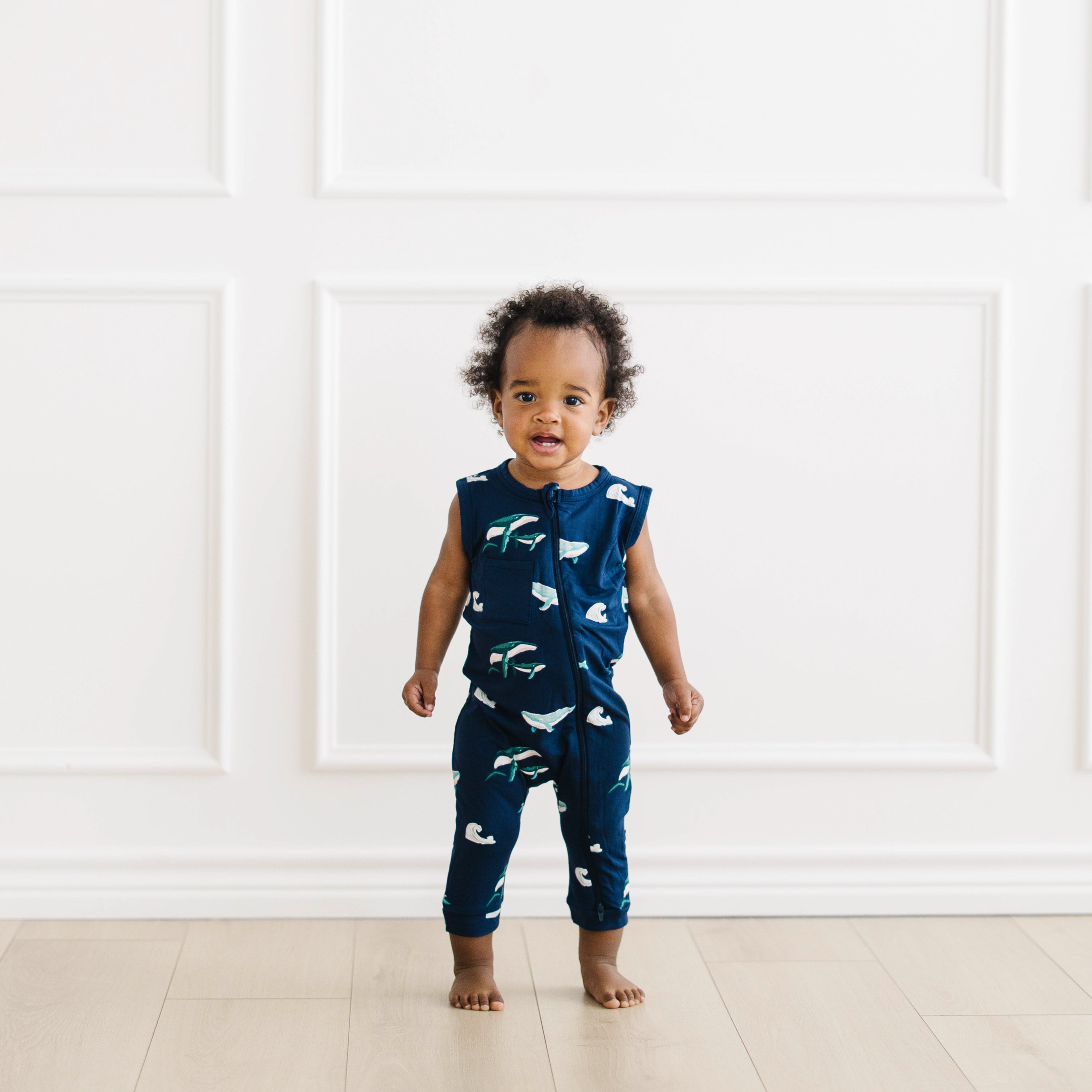 Toddler wearing Kyte Baby Sleeveless Zippered Romper in Humpback