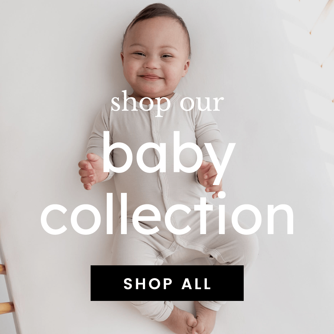 image of baby in romper with text that says shop our baby collection. shop all