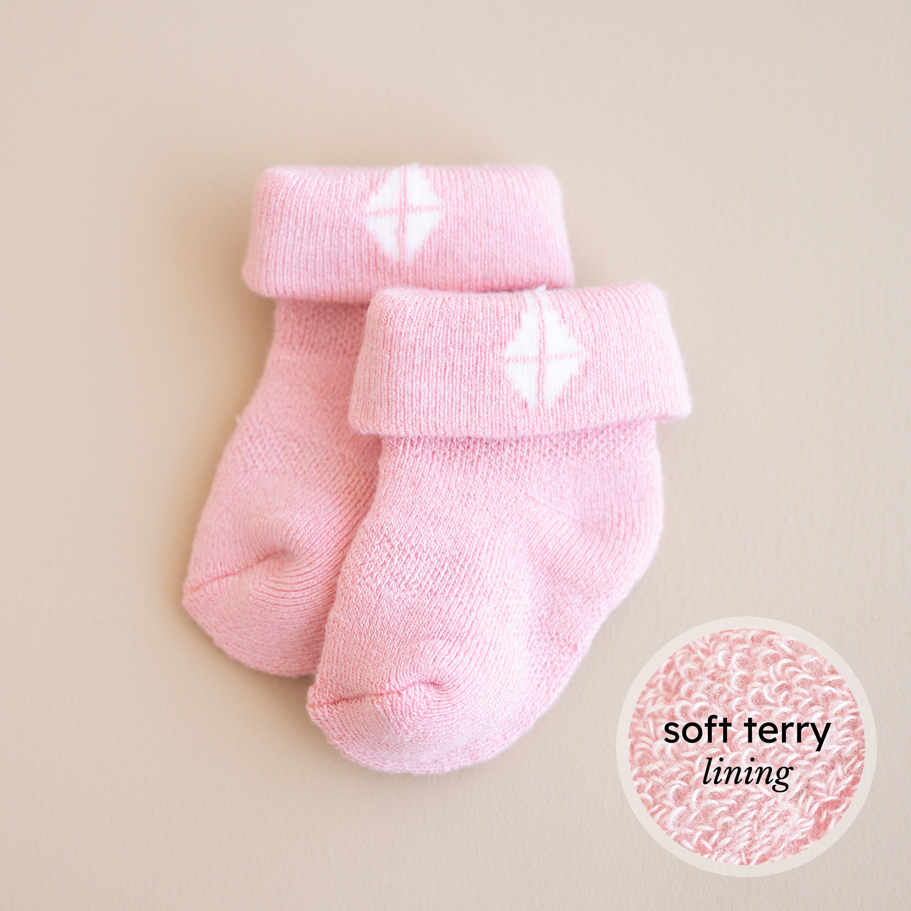 Pink infant socks with soft terry lining