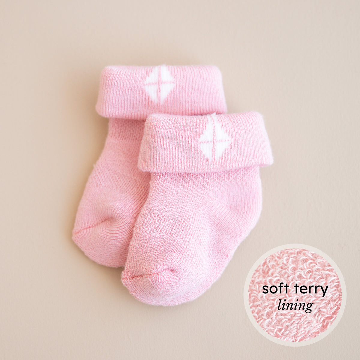 Pink infant socks with soft terry lining