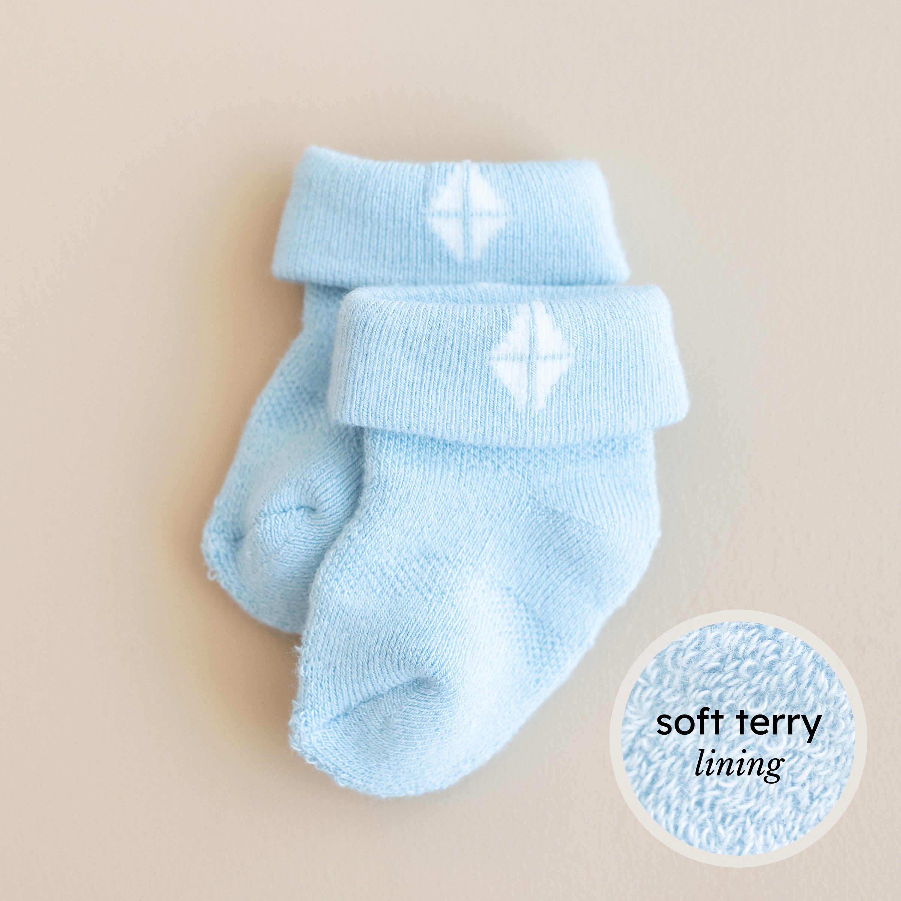 Blue infant socks with soft terry lining