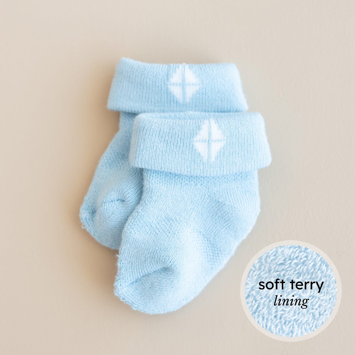 Blue infant socks with soft terry lining