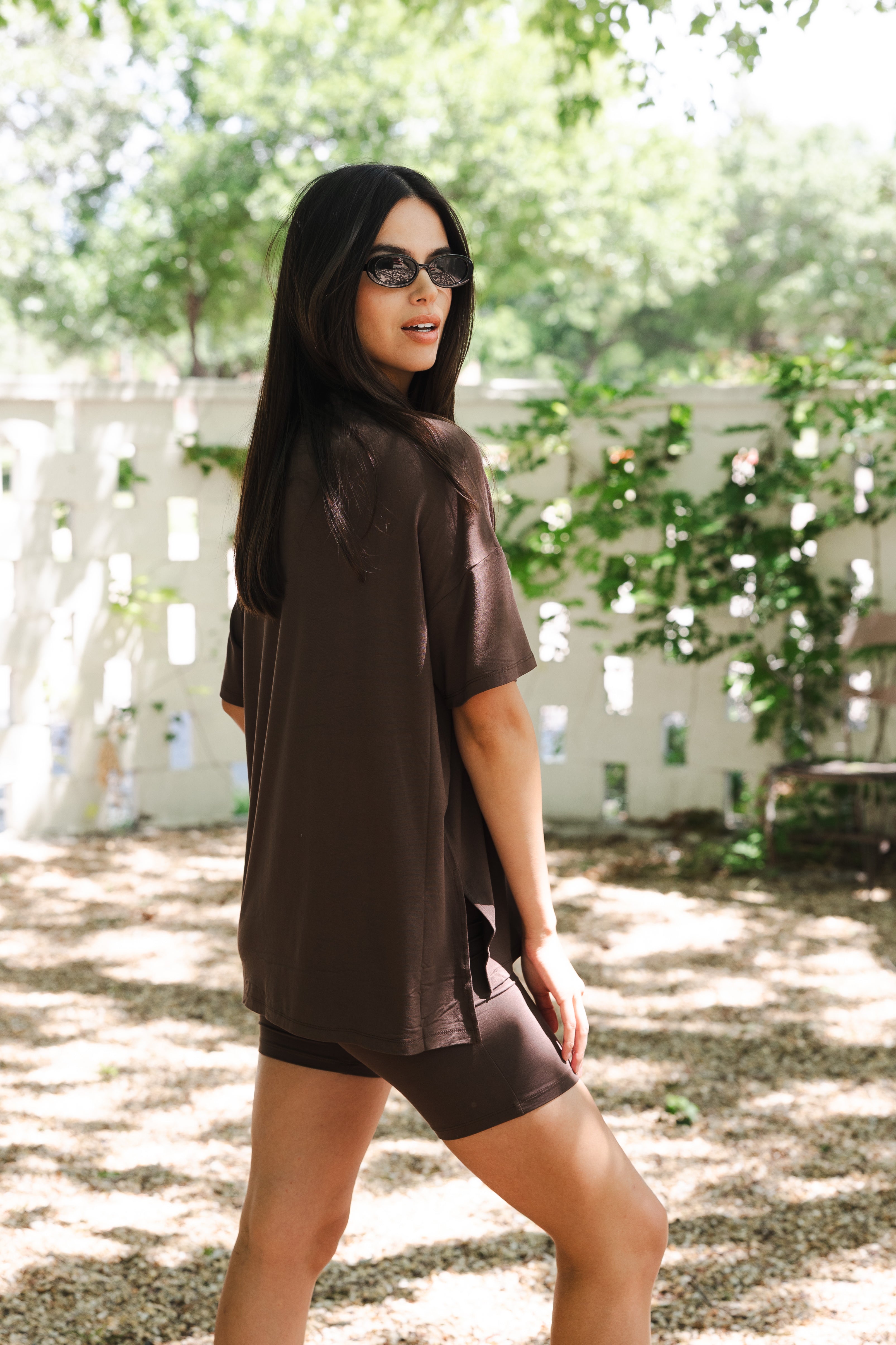 The back of the Women’s Biker Short Set in Espresso shown on a female model