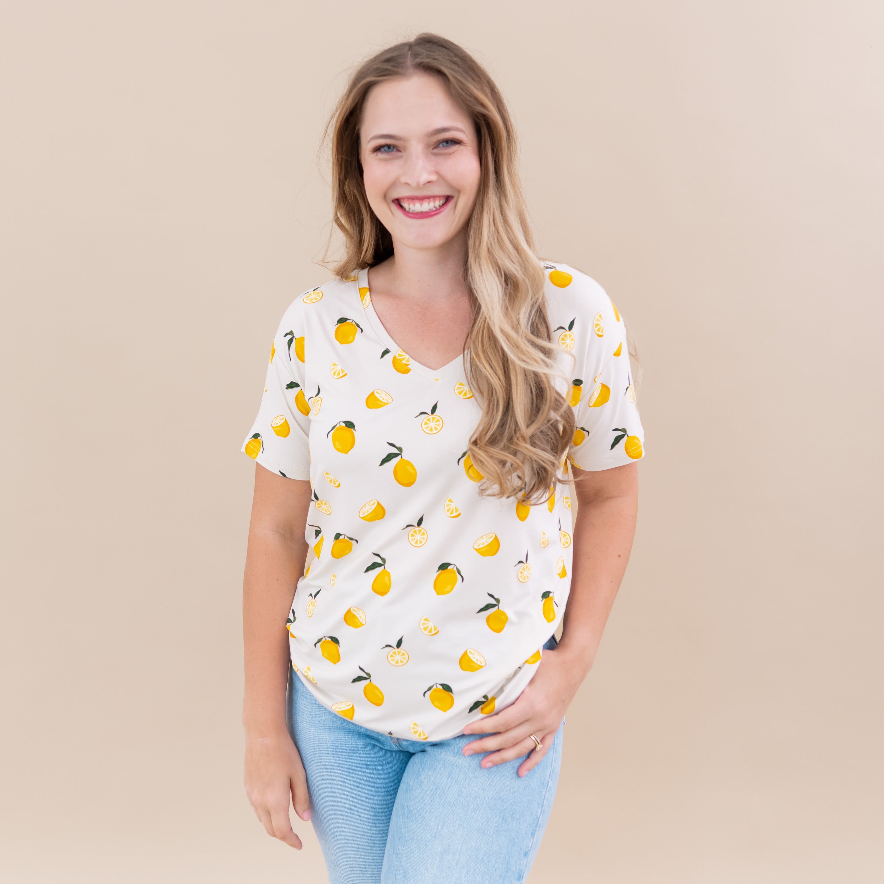 Woman wearing Kyte Baby Women's Relaxed Fit V-Neck in Lemon