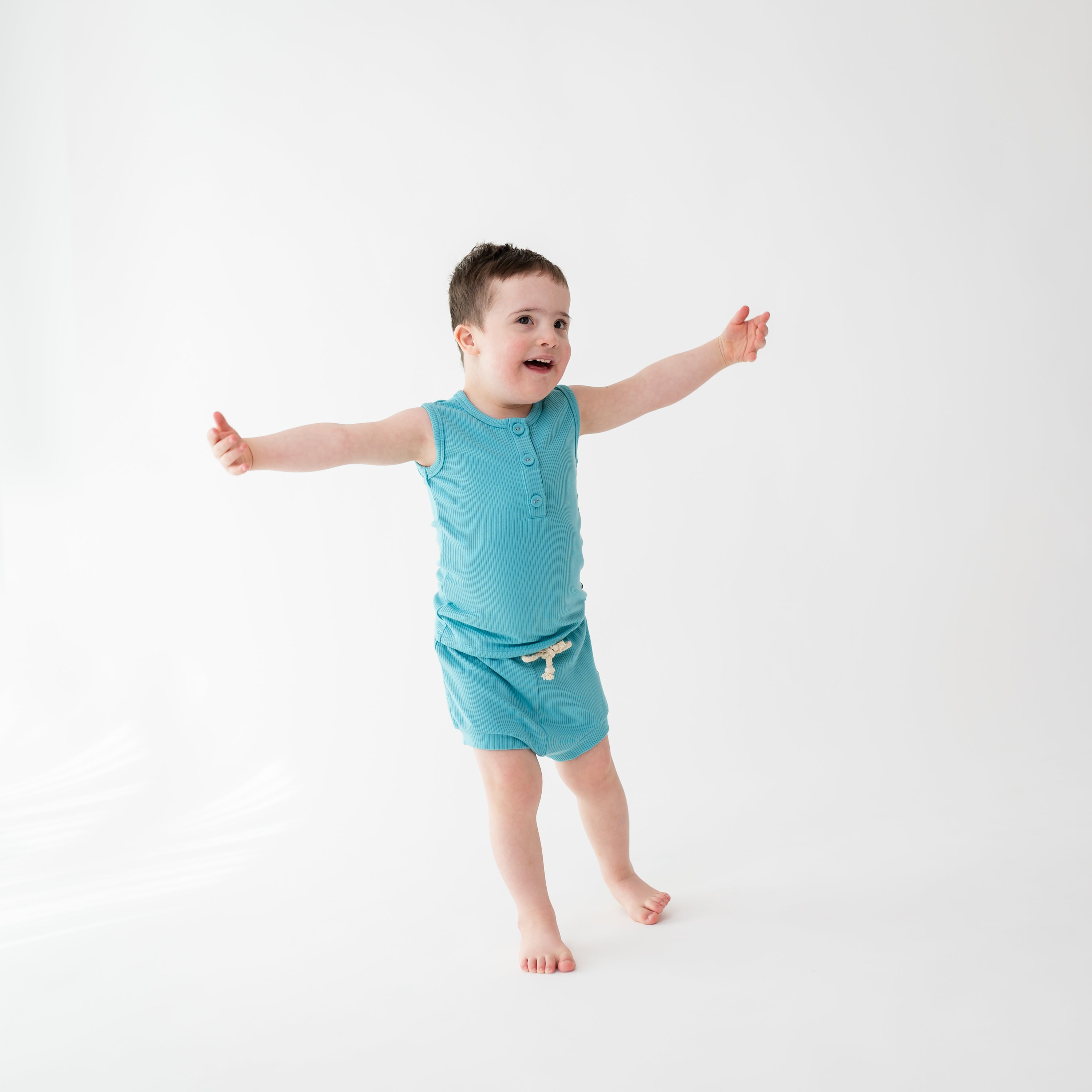 Child wearing Ribbed Henley Tank Set in Makai with Wooden Buttons