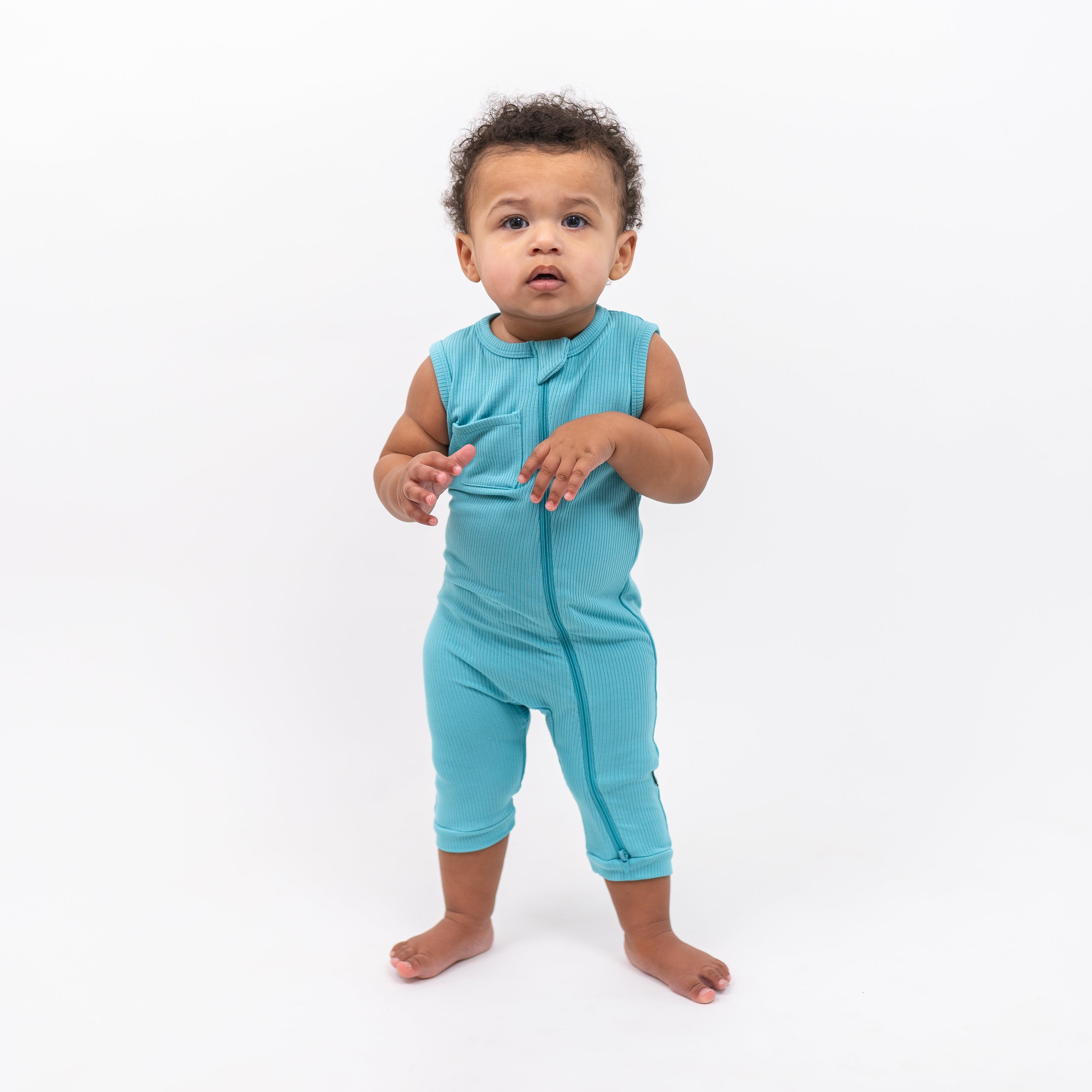 Toddler wearing Kyte Baby Sleeveless Zippered Romper in Makai