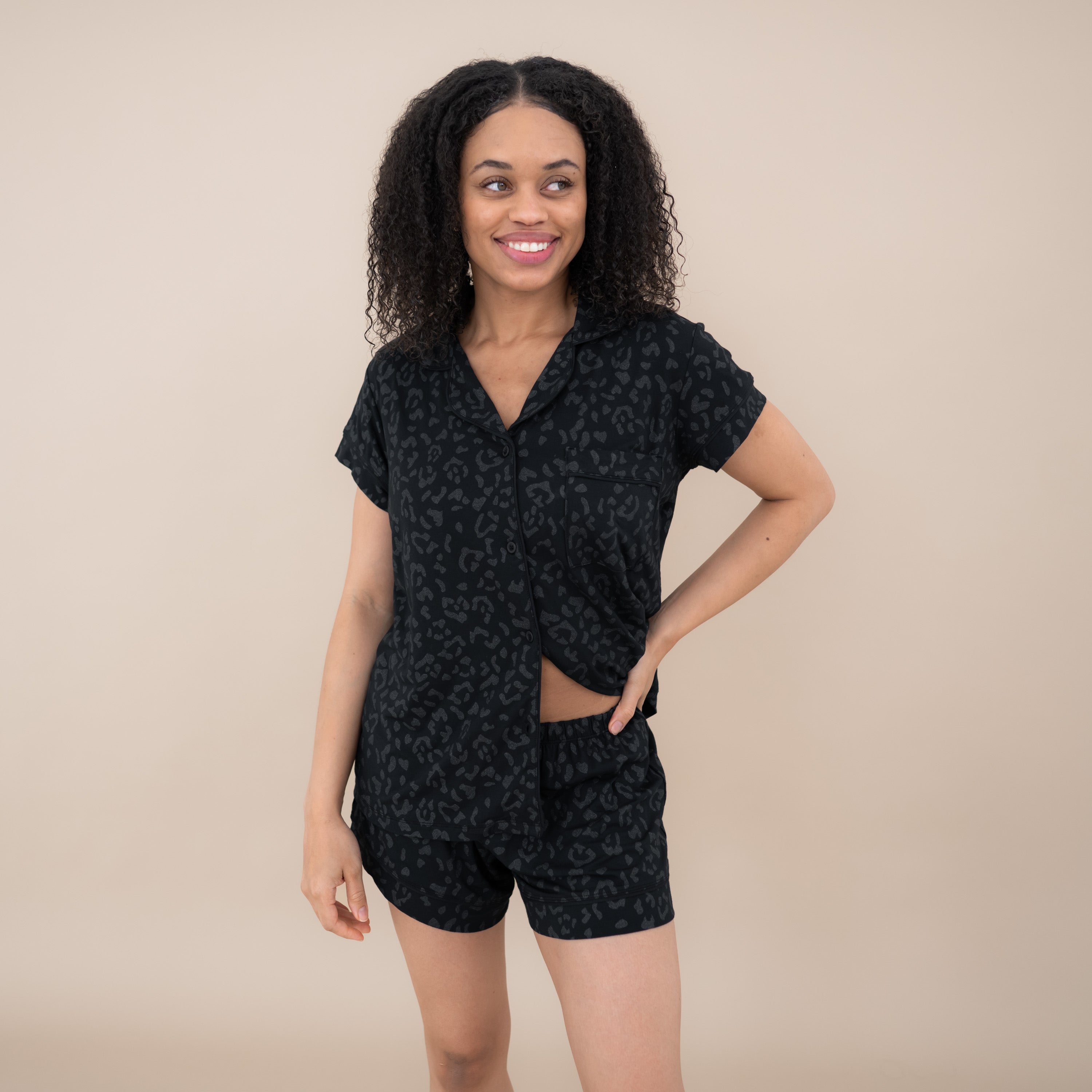 Woman modeling Women’s Short Sleeve Pajama Set in Midnight Leopard