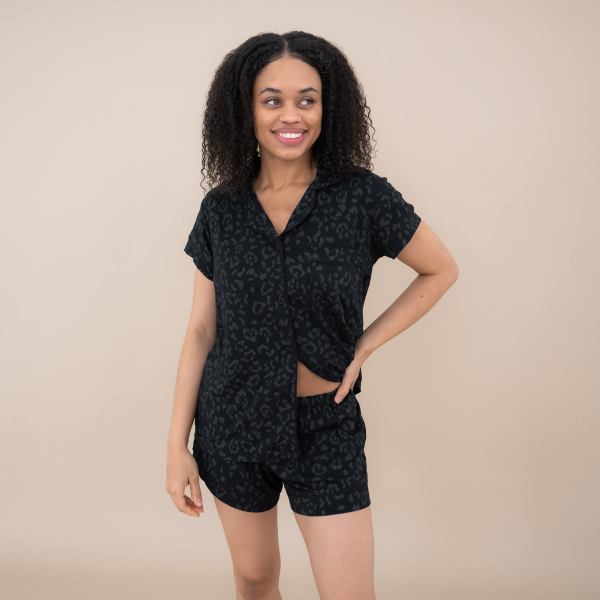 Woman modeling Women’s Short Sleeve Pajama Set in Midnight Leopard