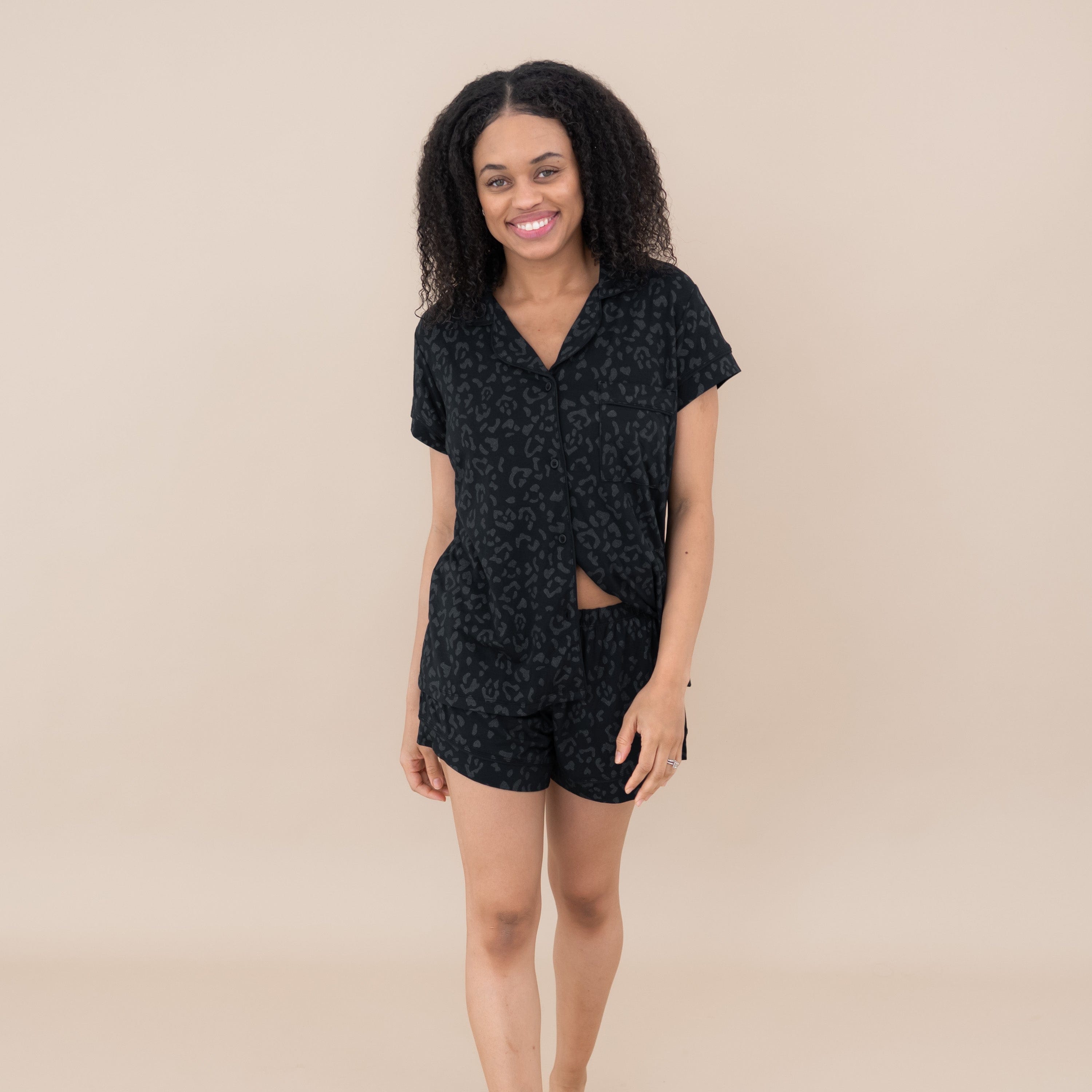Woman modeling Women’s Short Sleeve Pajama Set in Midnight Leopard