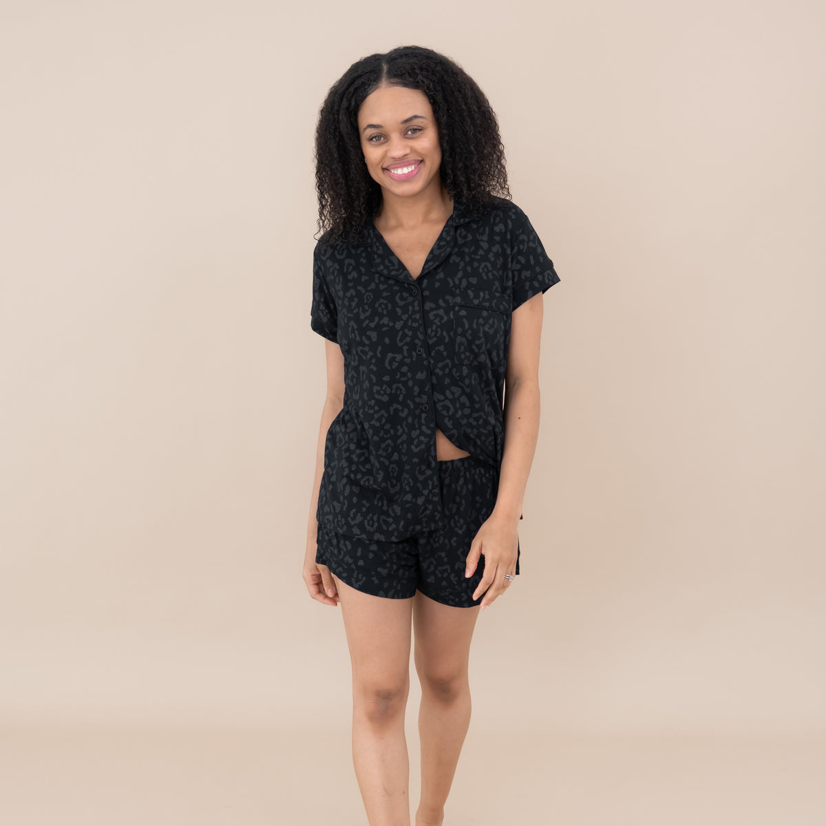 Woman modeling Women’s Short Sleeve Pajama Set in Midnight Leopard