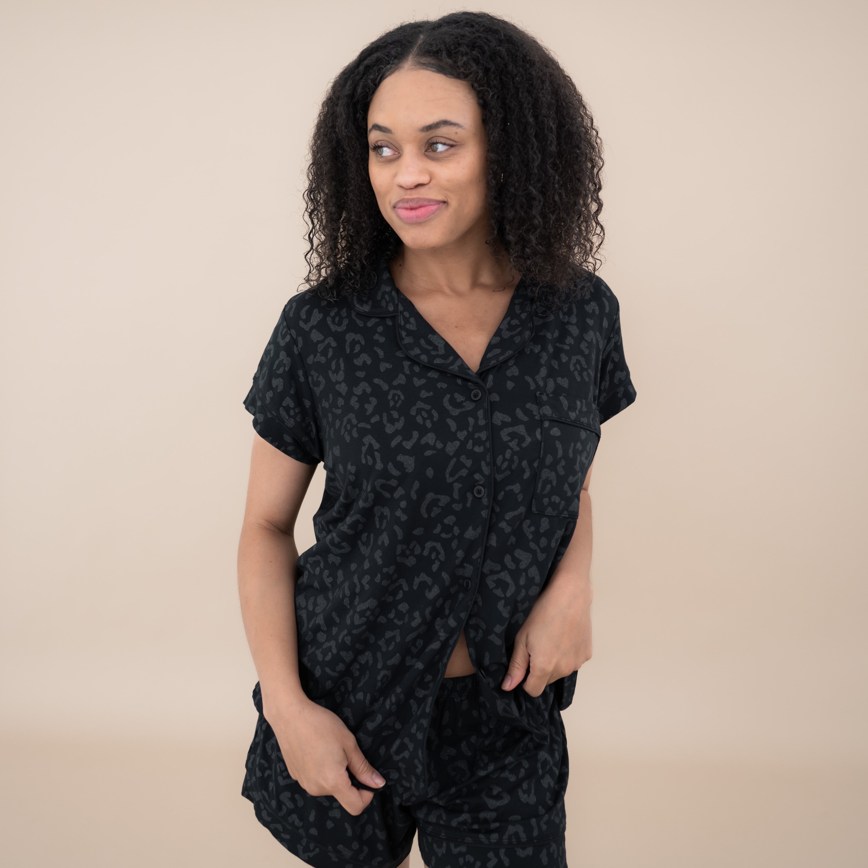 Woman modeling Women’s Short Sleeve Pajama Set in Midnight Leopard