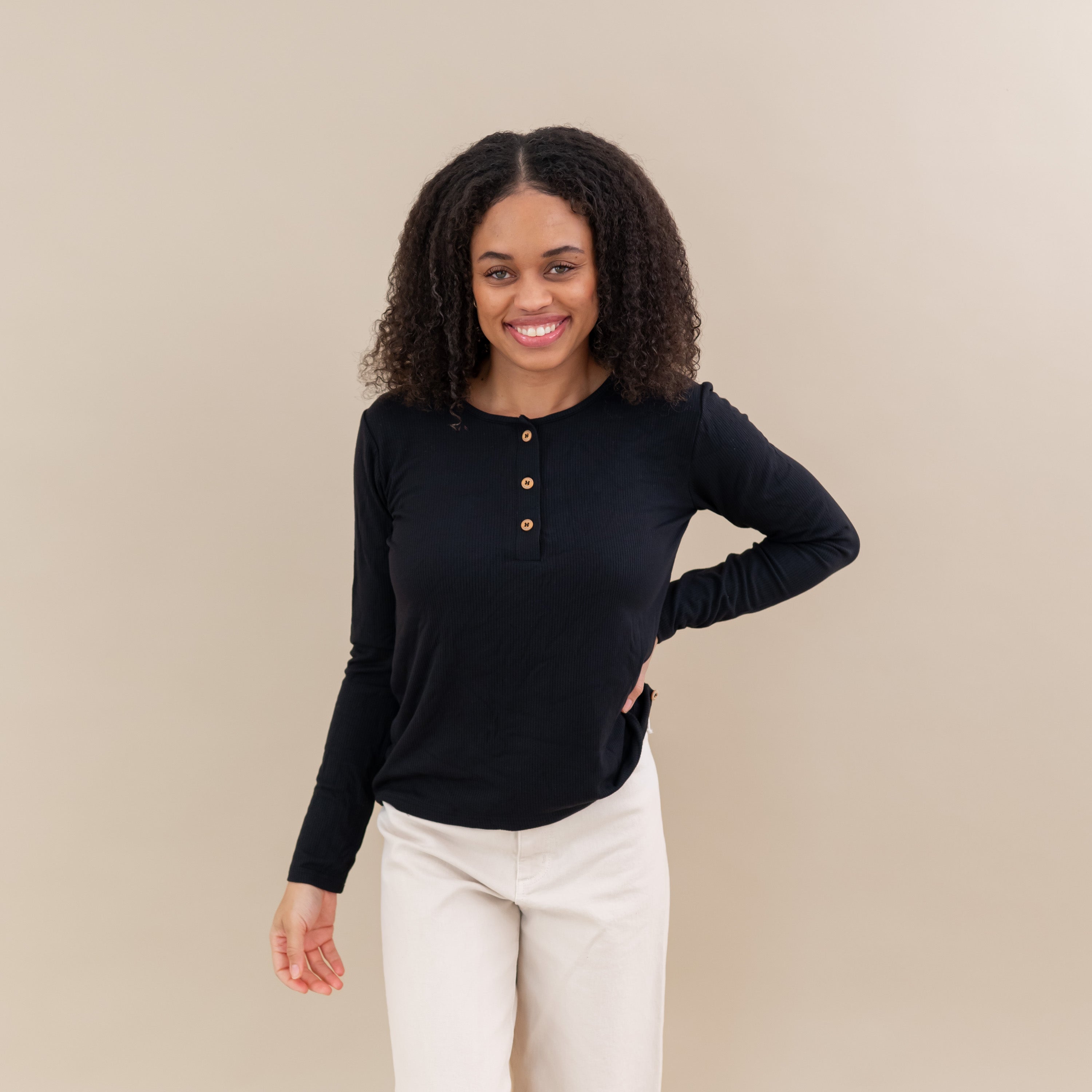 Woman modeling Women's Ribbed Henley Top in Midnight