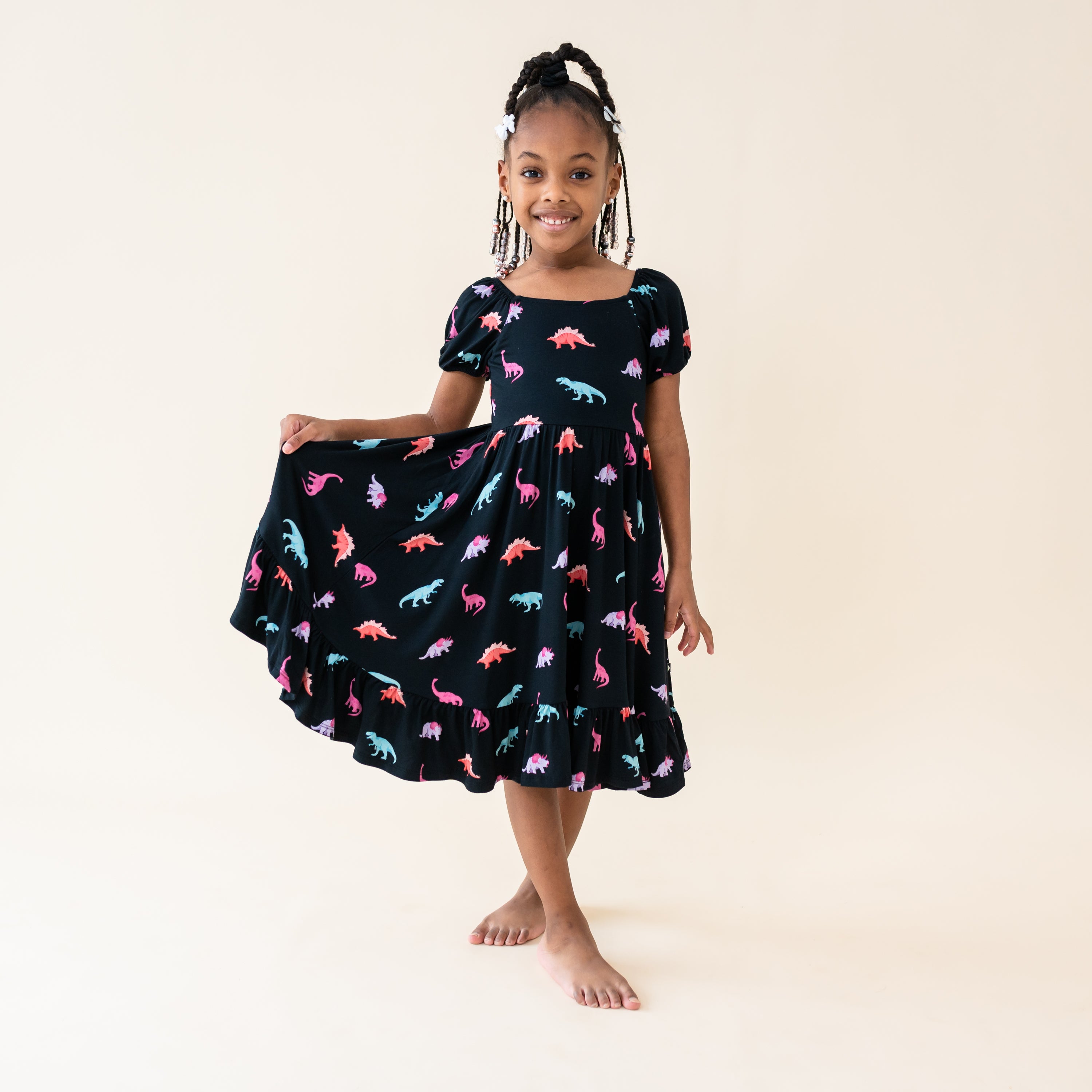 Girl modeling the Puff Sleeve Twirl Dress in Midnight Roar