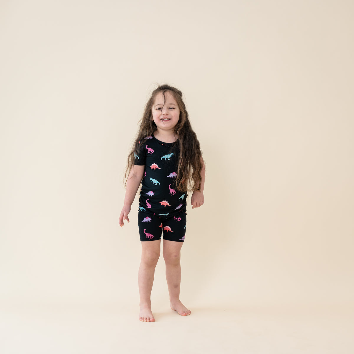 Child wearing Midnight Roar Short Sleeve Toddler Pajama Set