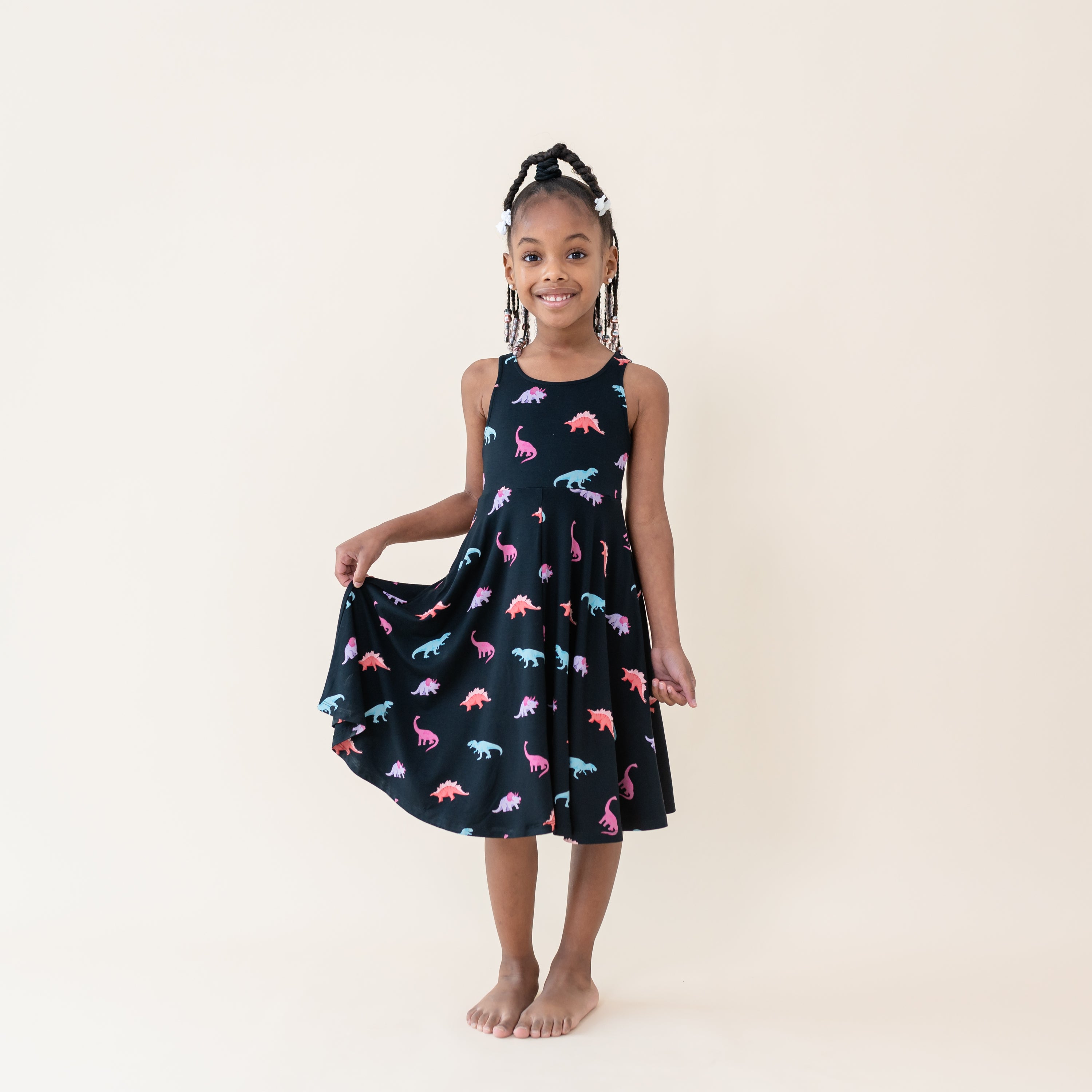 Young girl modeling the Midnight Roar Tank Twirl Dress