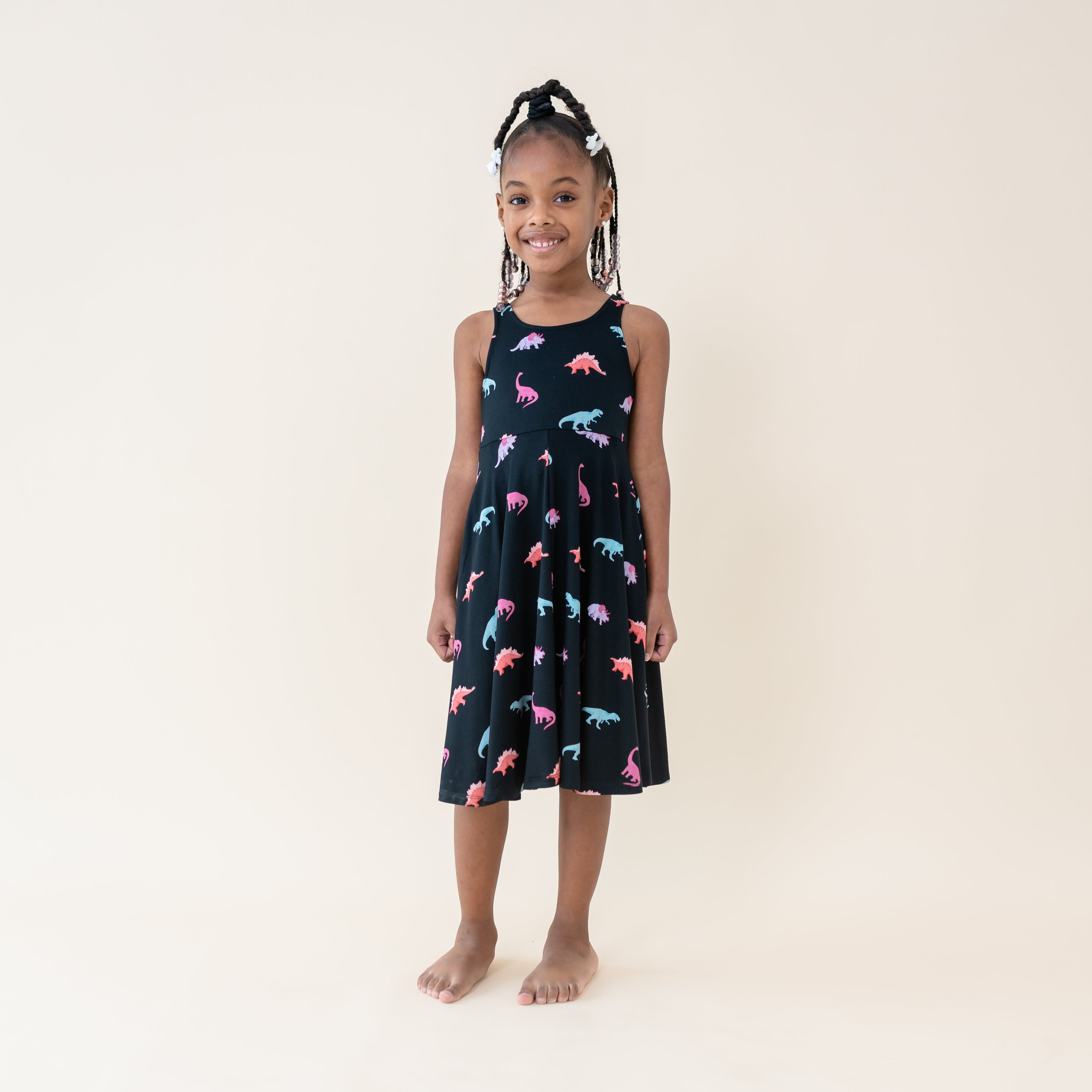 Girl modeling the Twirl Tank Dress in Midnight Roar