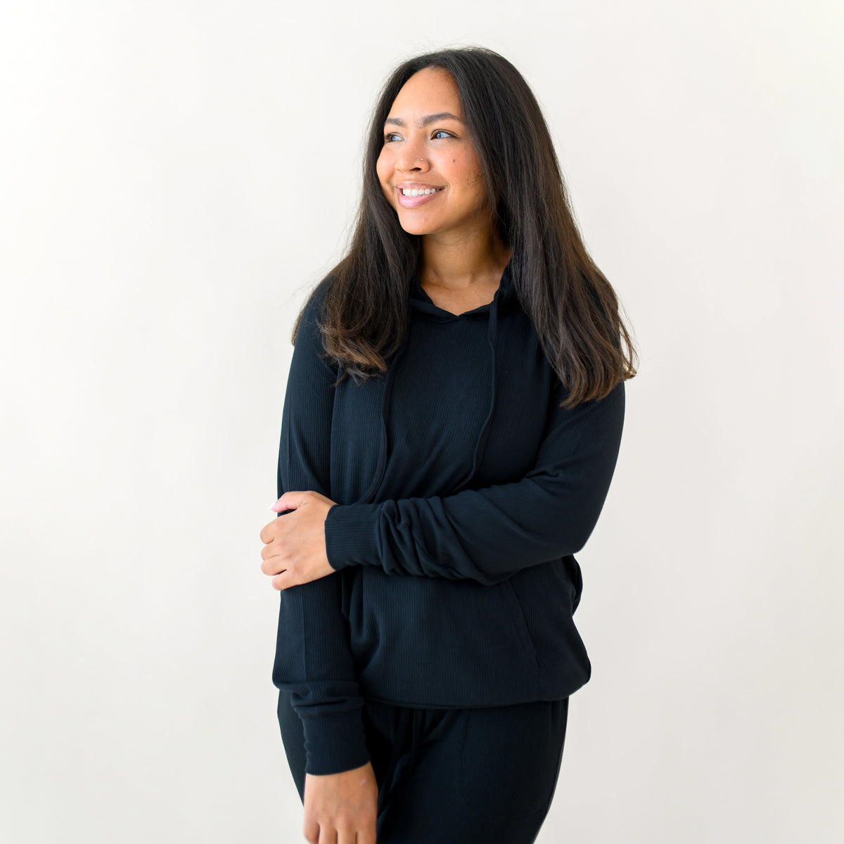 Woman modeling Women's Ribbed Hoodie in Midnight
