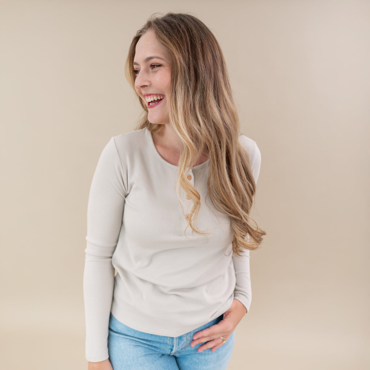 Woman modeling Women's Ribbed Henley Top in Oat