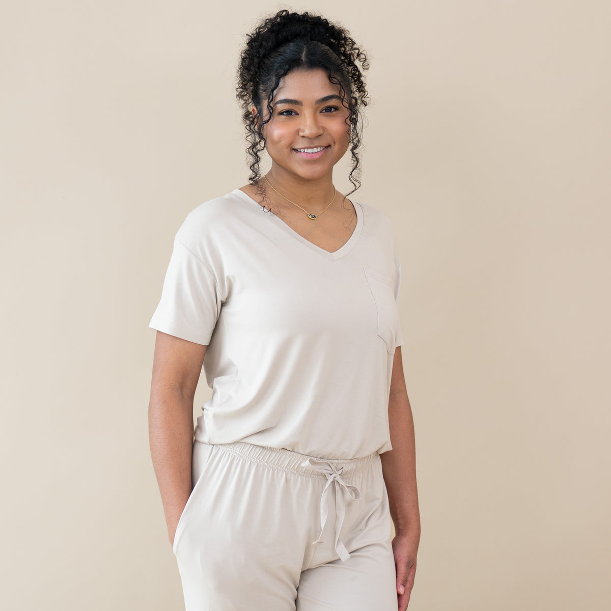 Woman modeling Women’s Relaxed Fit V-Neck in Oat