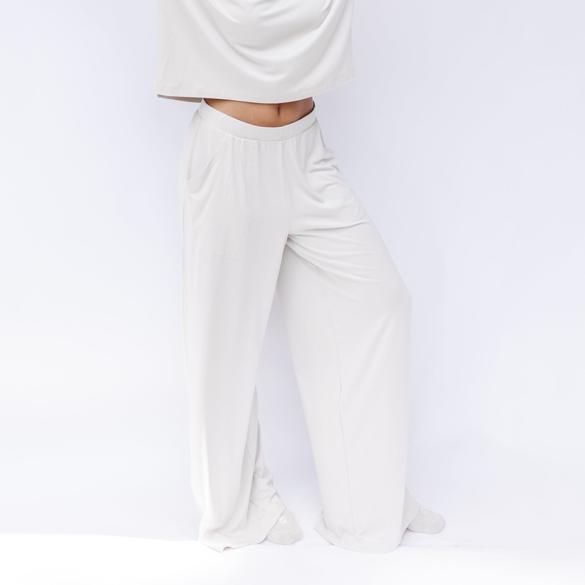 Women's Wide Leg Pant in Oat shown on a model in front of a white backdrop