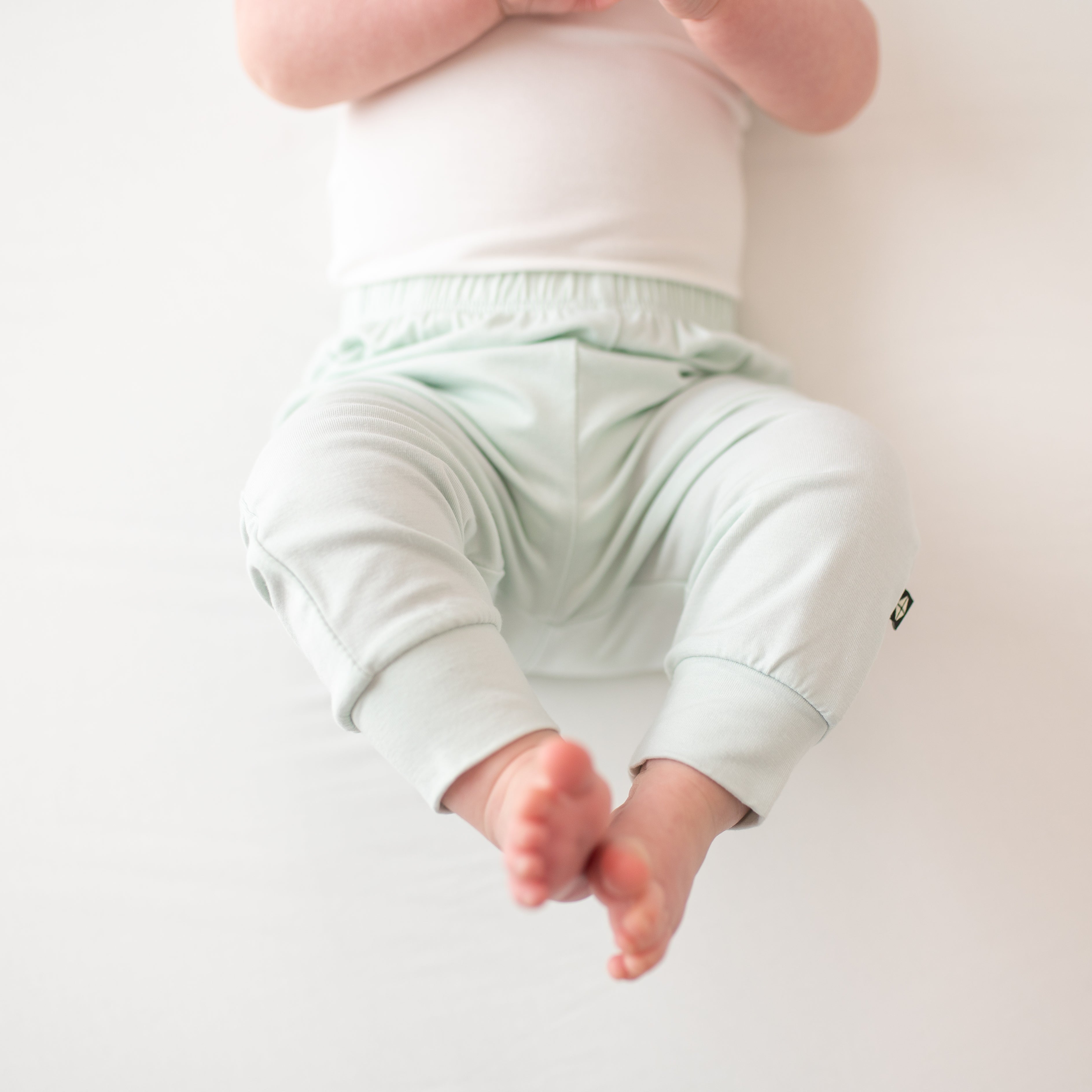 Close up of the Pant in Dew on infant model