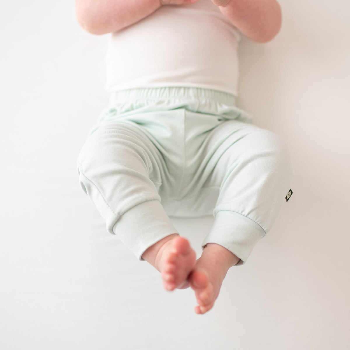 Close up of the Pant in Dew on infant model