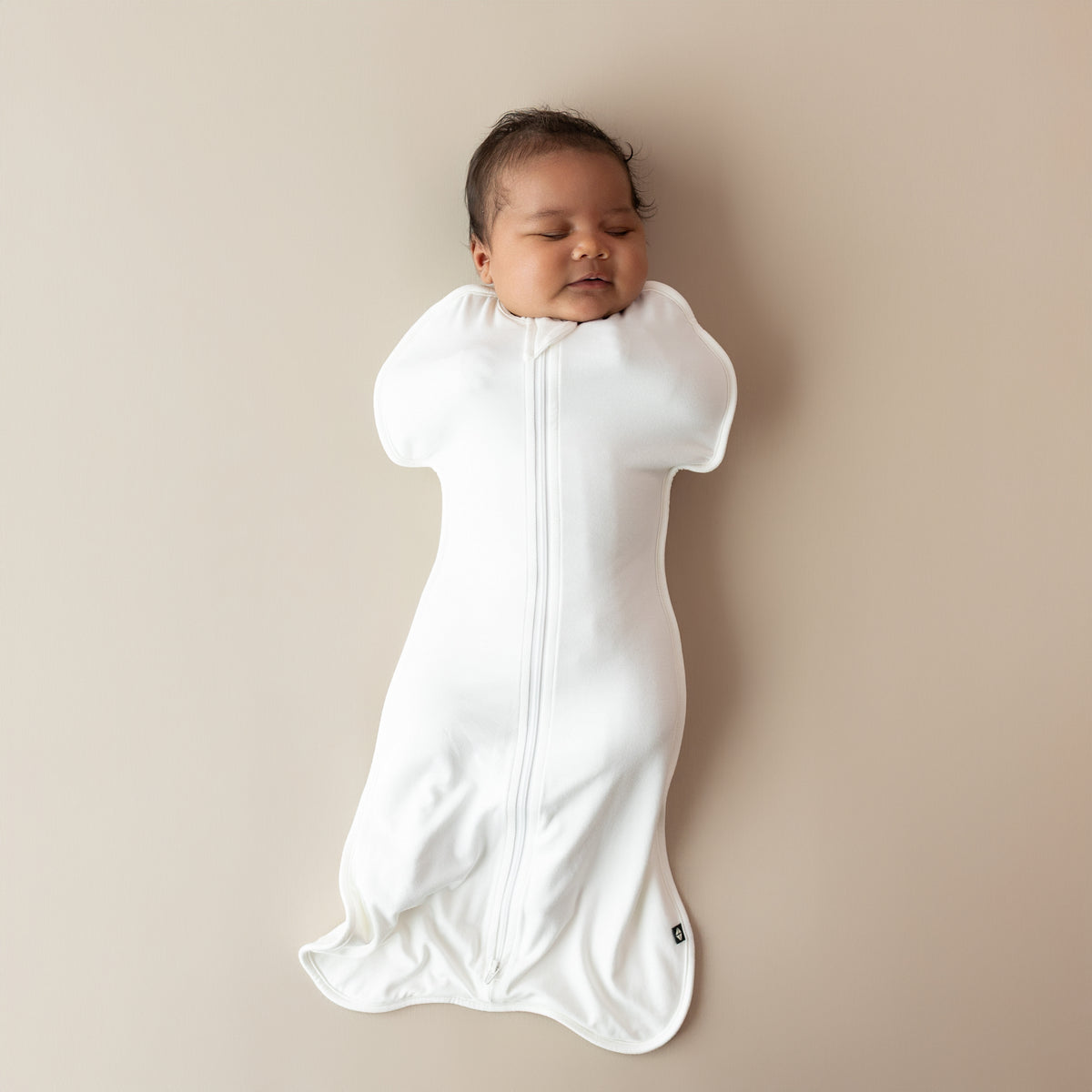 Baby sleeping in Swaddle Bag in Cloud 0.5
