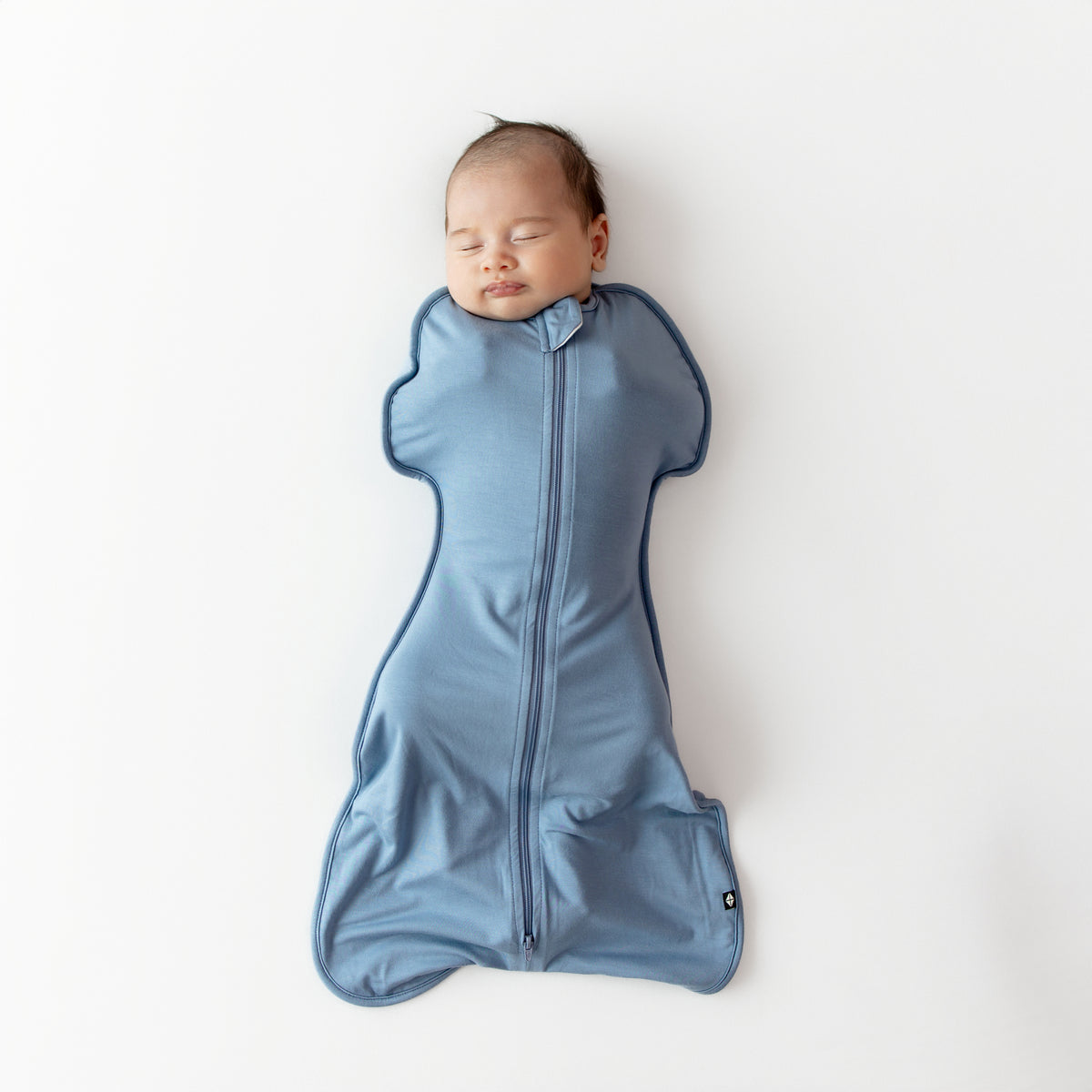 Baby sleeping in Swaddle Bag in Slate 0.5