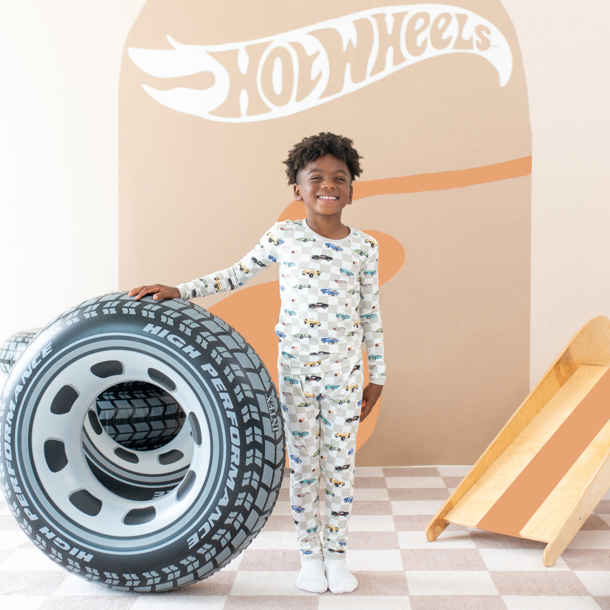 Boy wearing Long Sleeve Pajamas in Fast and Fierce Hot Wheels pjs