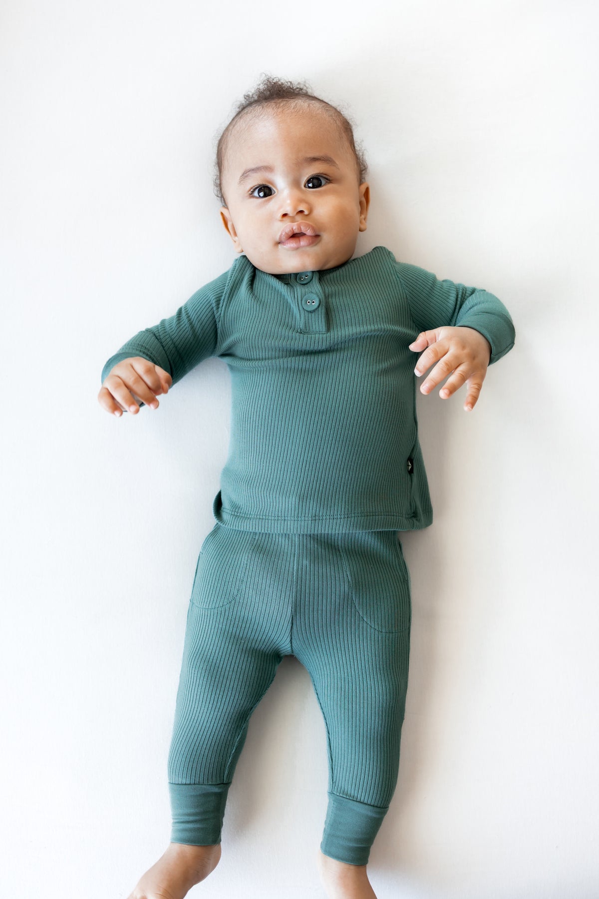 Baby wearing Ribbed Infant Henley Set in Pine on a white background