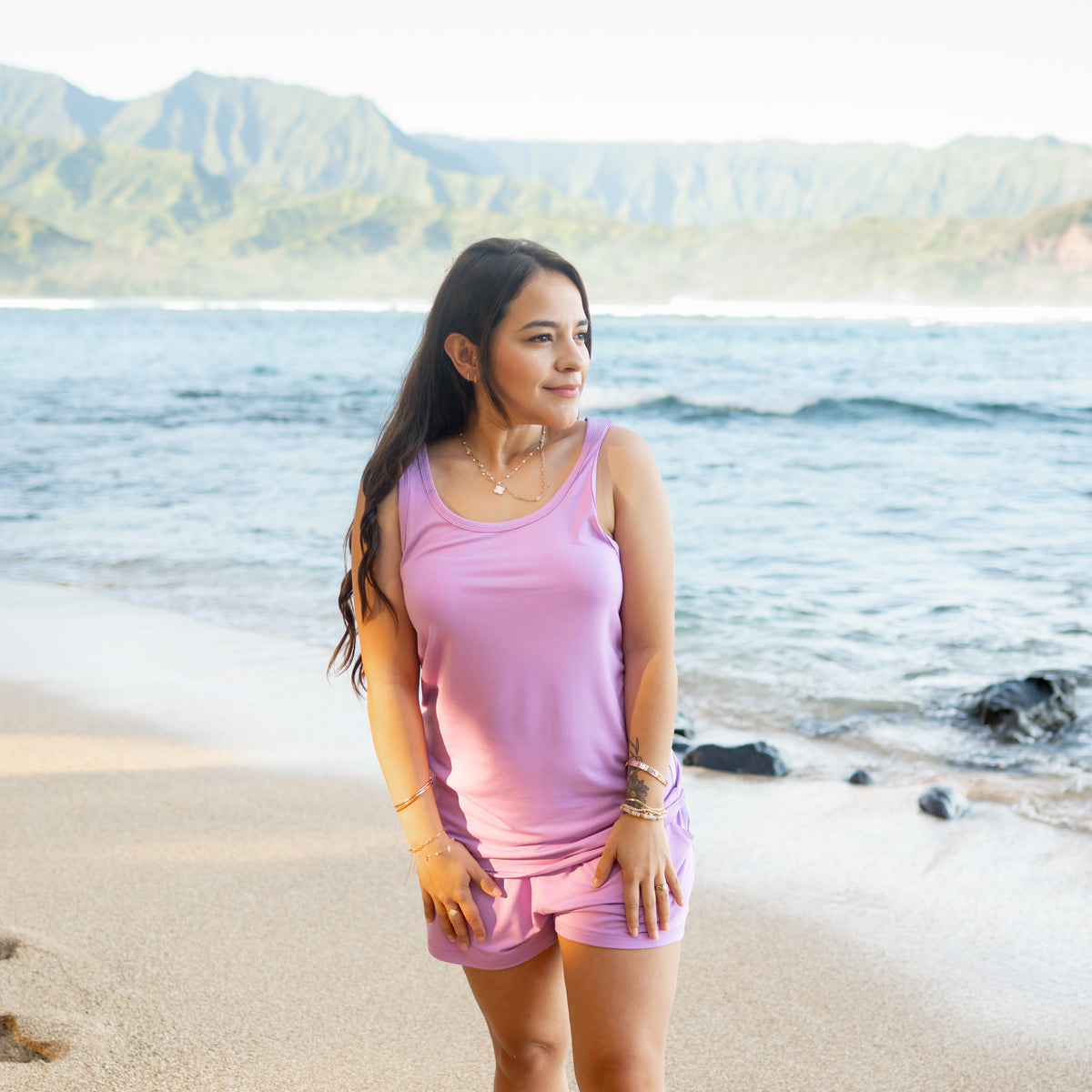 Woman modeling Women’s Tank Set in Poi on beach