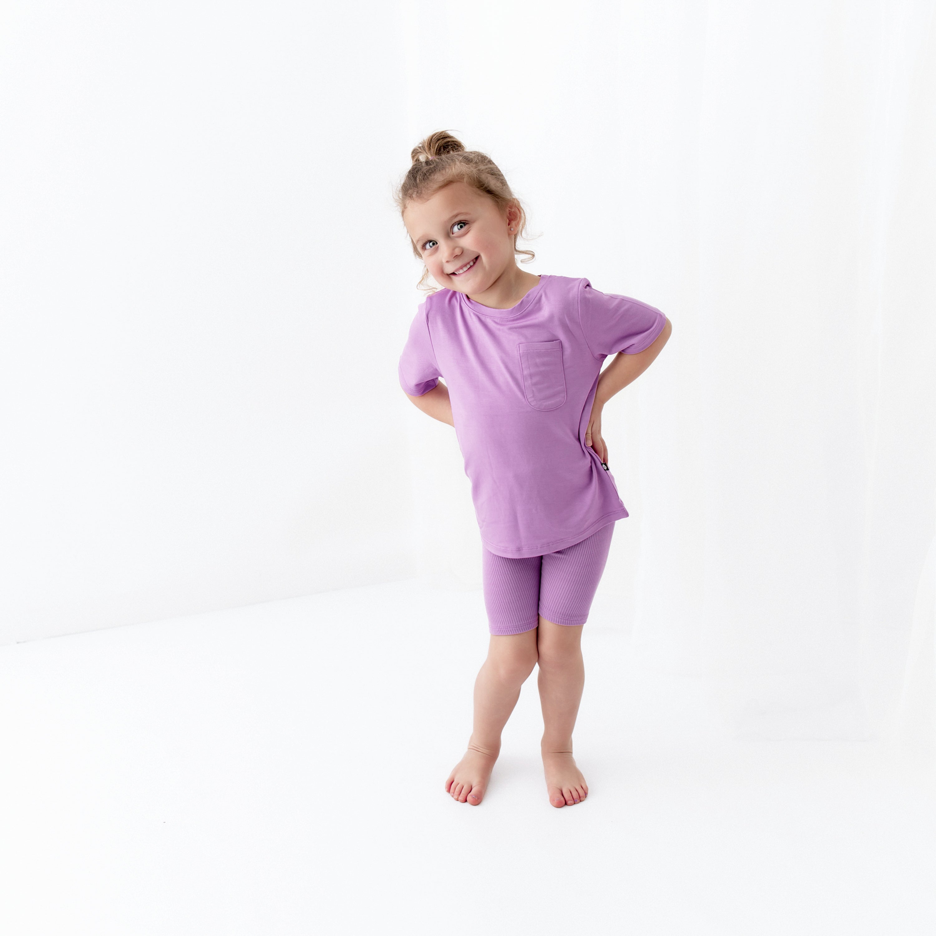 Girl wearing Toddler Crew Neck Tee in Poi with Matching shorts