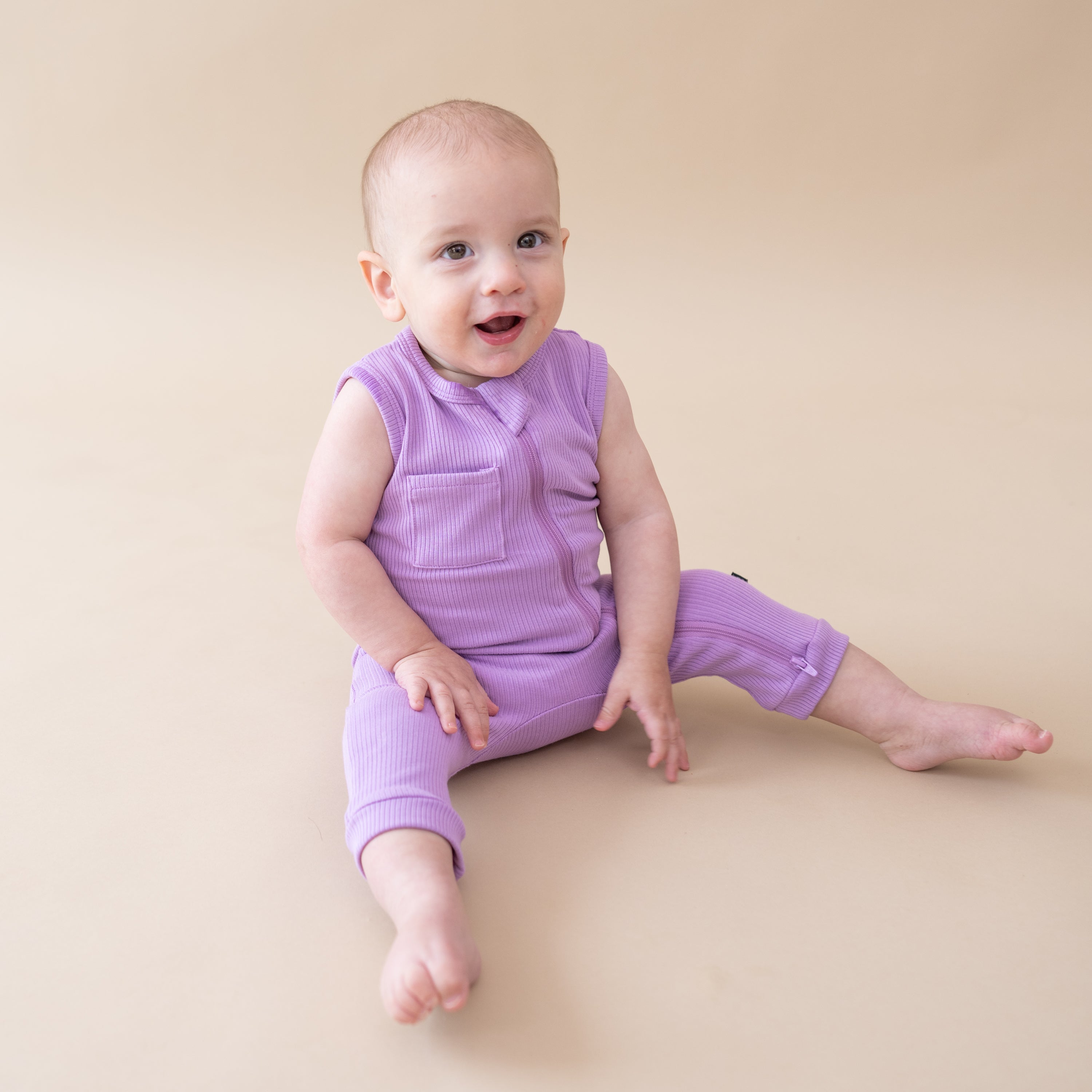 Baby wearing Bamboo Ribbed Zippered Sleeveless Romper in Poi