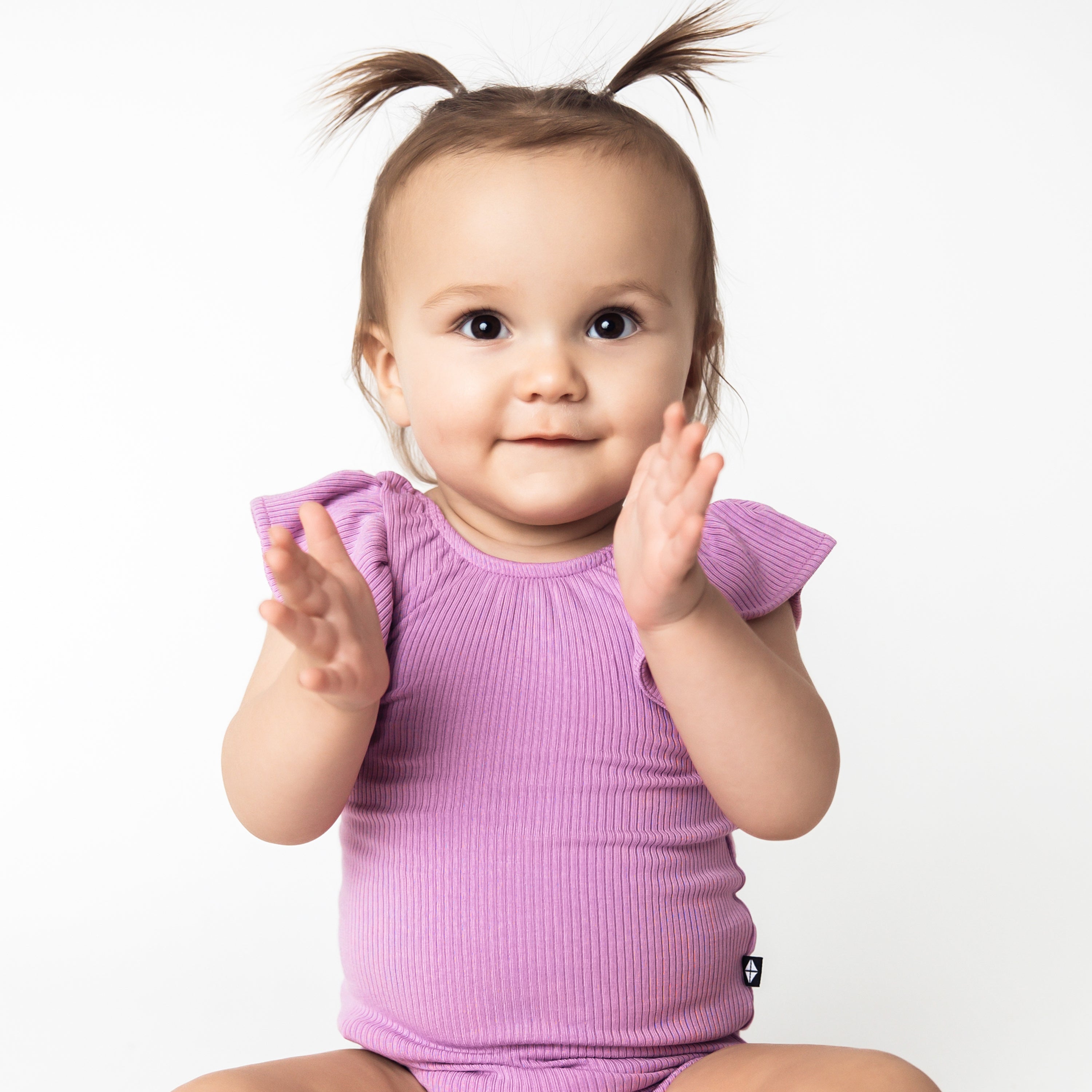 Baby wearing Ribbed Ruffle Sleeveless Leotard in Poi