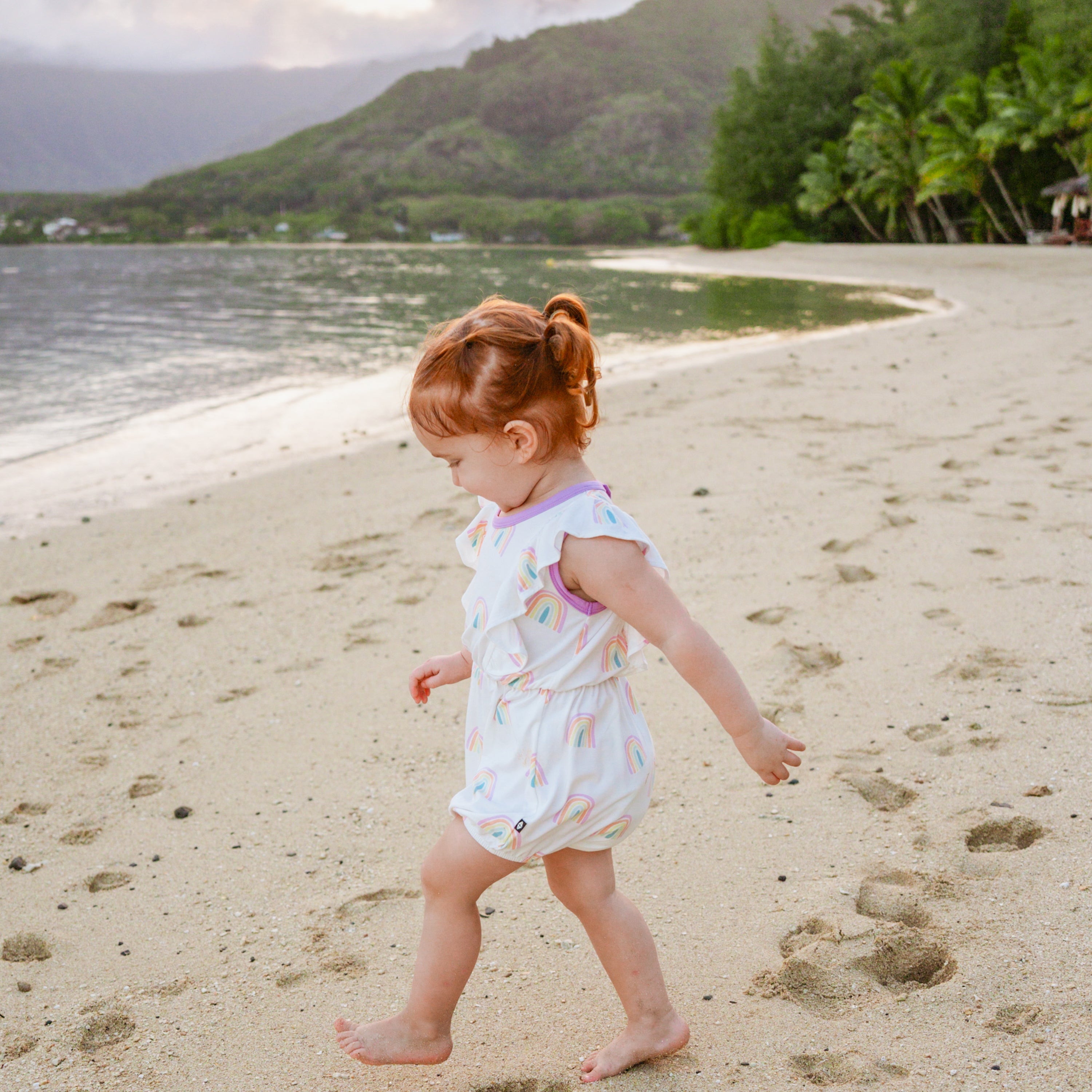 Toddler wearing Bamboo Bubble Romper in Poi Rainbow